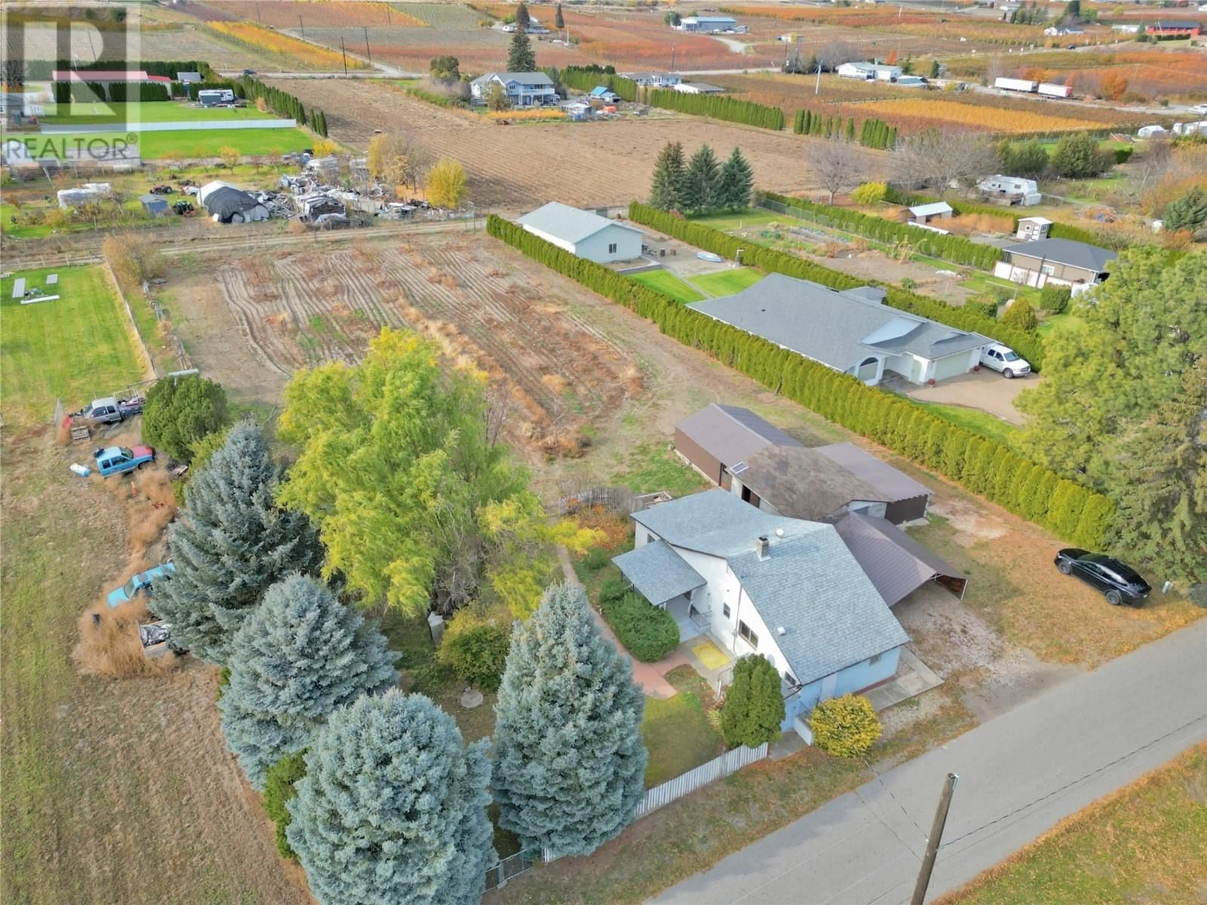 A pic from outside/outdoor area/front of a property/back of a property/a pic from drone, unknown for 5218 HAYNES ROAD, Oliver British Columbia V0H1T1