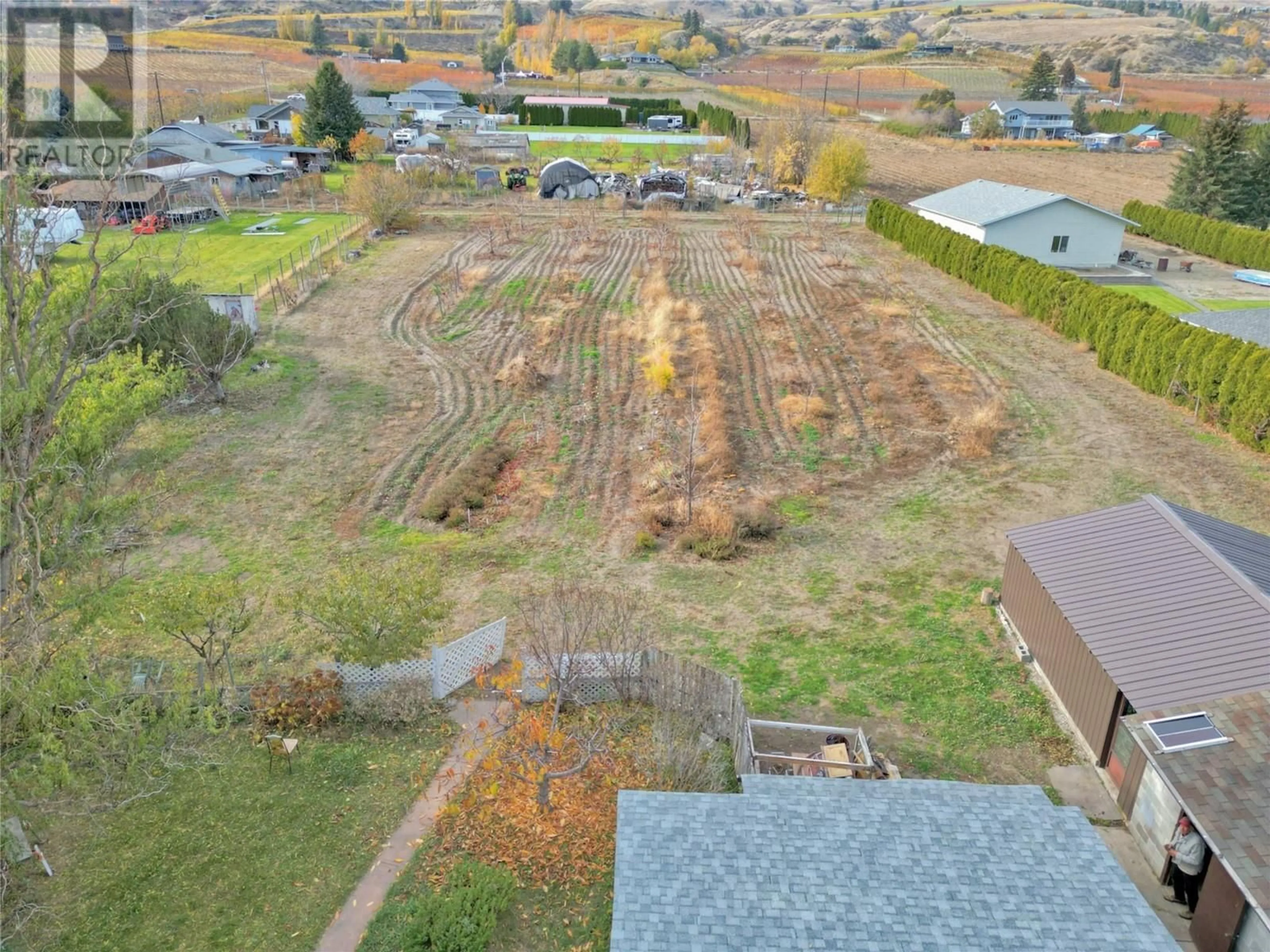 A pic from outside/outdoor area/front of a property/back of a property/a pic from drone, mountain view for 5218 HAYNES ROAD, Oliver British Columbia V0H1T1