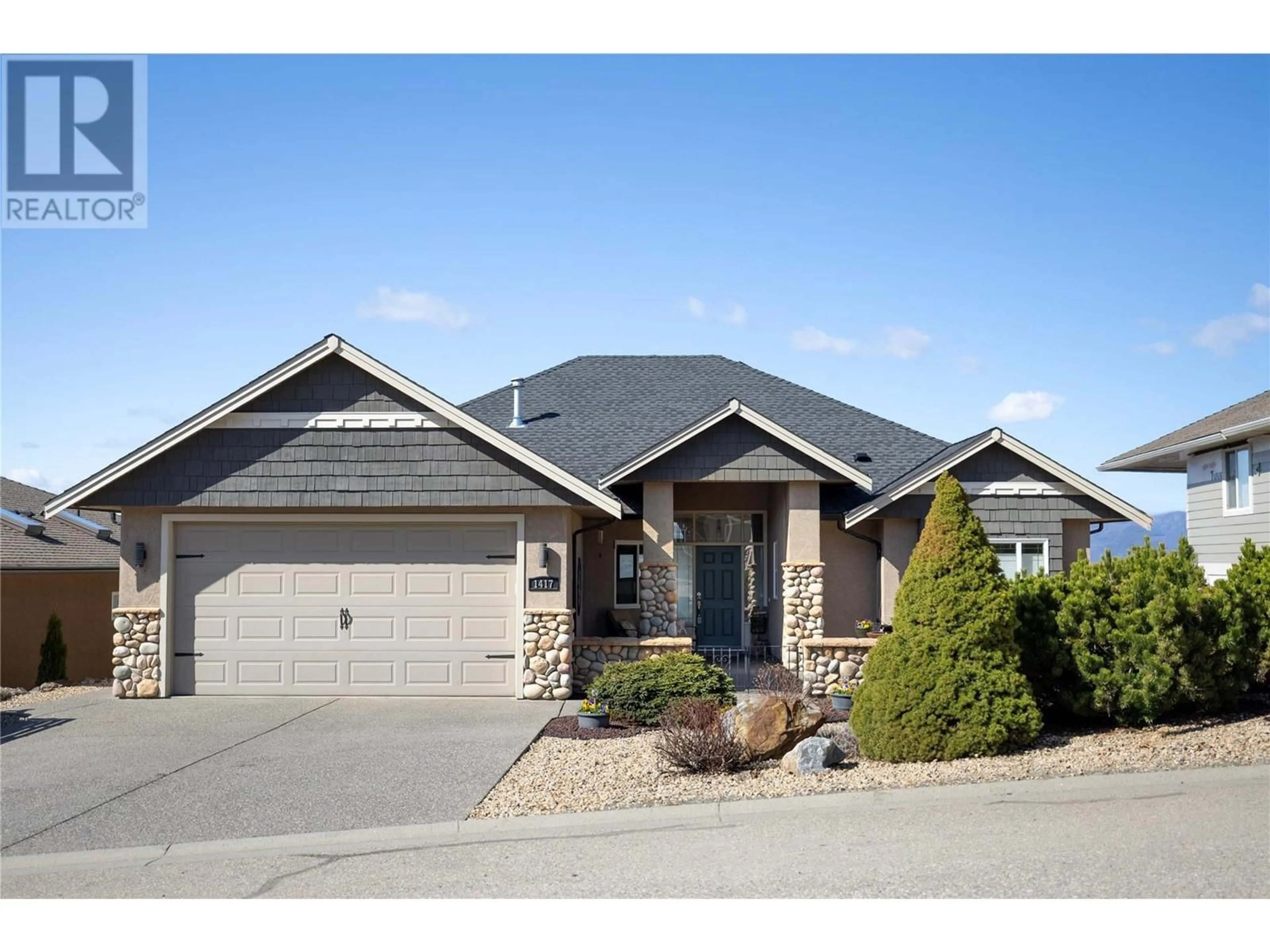 Home with brick exterior material, street for 1417 COPPER MOUNTAIN COURT, Vernon British Columbia V1B3Y7