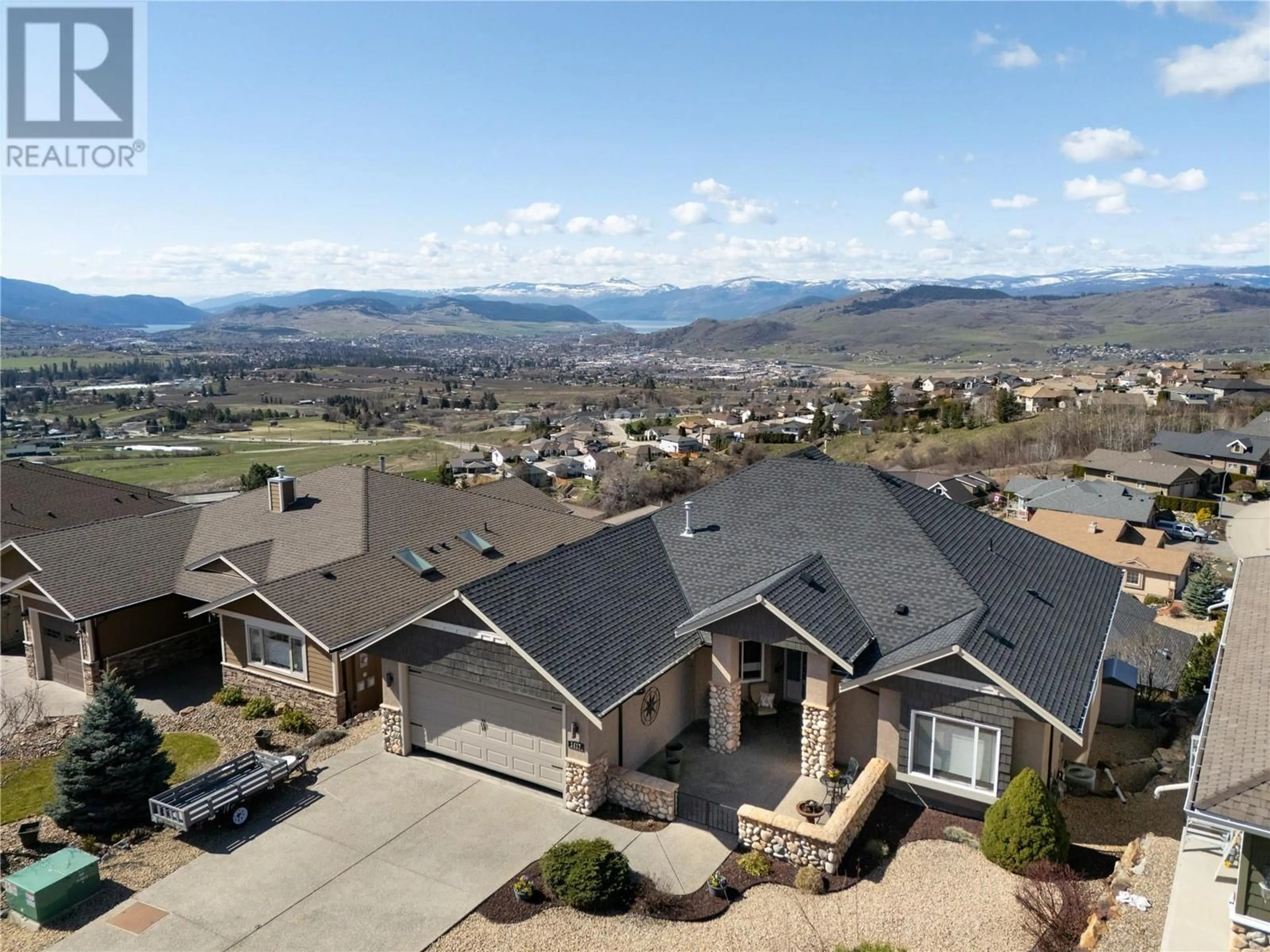 A pic from outside/outdoor area/front of a property/back of a property/a pic from drone, mountain view for 1417 COPPER MOUNTAIN COURT, Vernon British Columbia V1B3Y7