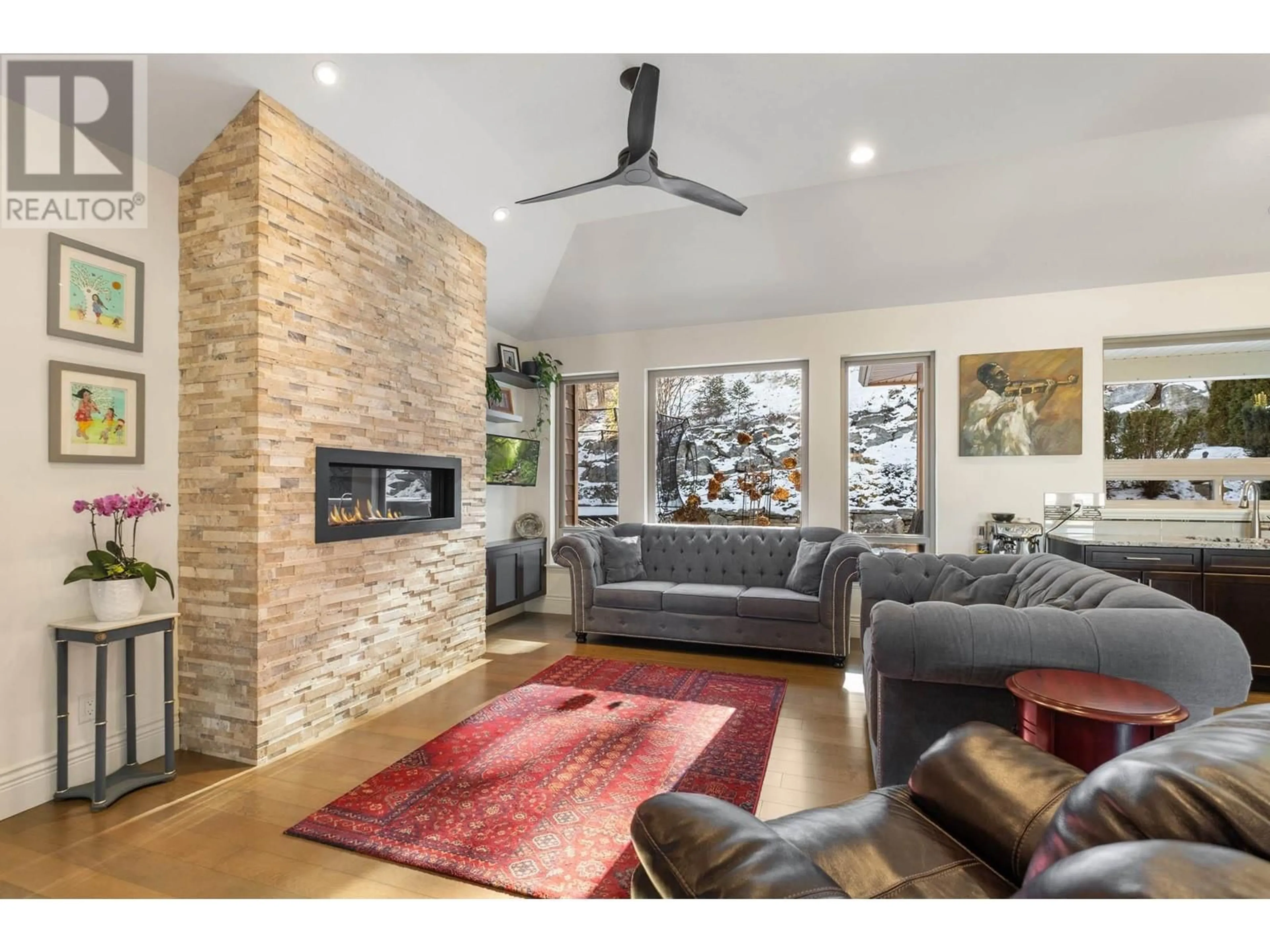 Living room with furniture, unknown for 3920 GALLAGHERS CIRCLE, Kelowna British Columbia V1W3Z9
