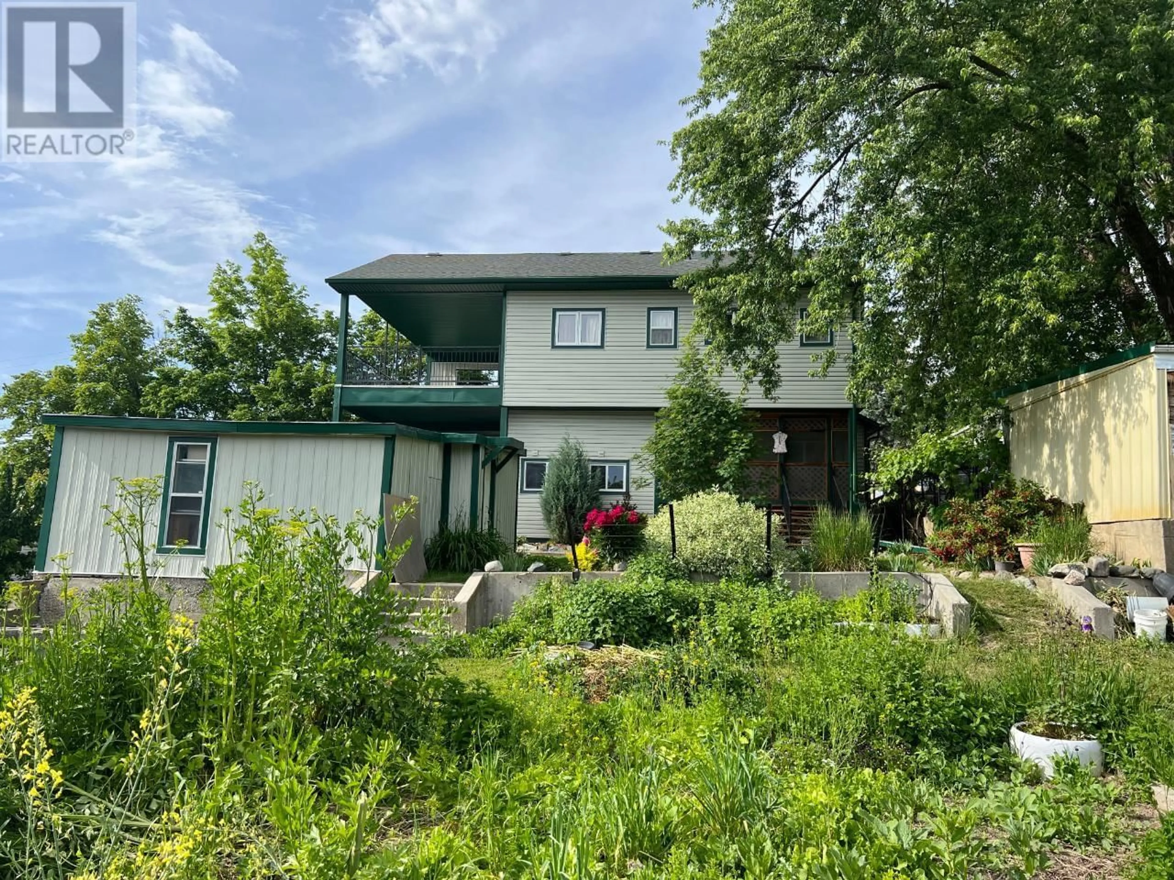 A pic from outside/outdoor area/front of a property/back of a property/a pic from drone, unknown for 1121 ERICKSON ROAD, Creston British Columbia V0B1G1