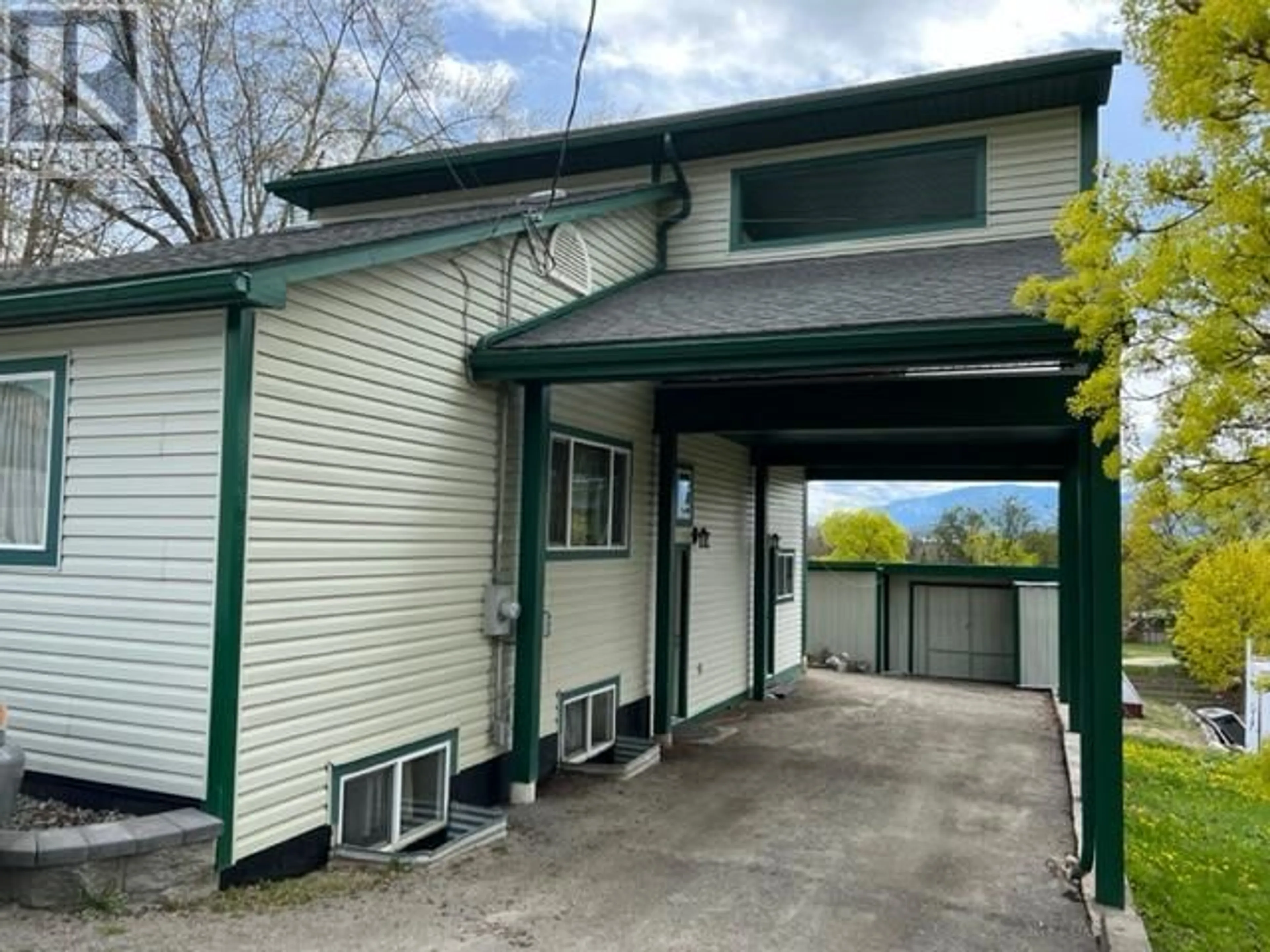 A pic from outside/outdoor area/front of a property/back of a property/a pic from drone, building for 1121 ERICKSON ROAD, Creston British Columbia V0B1G1