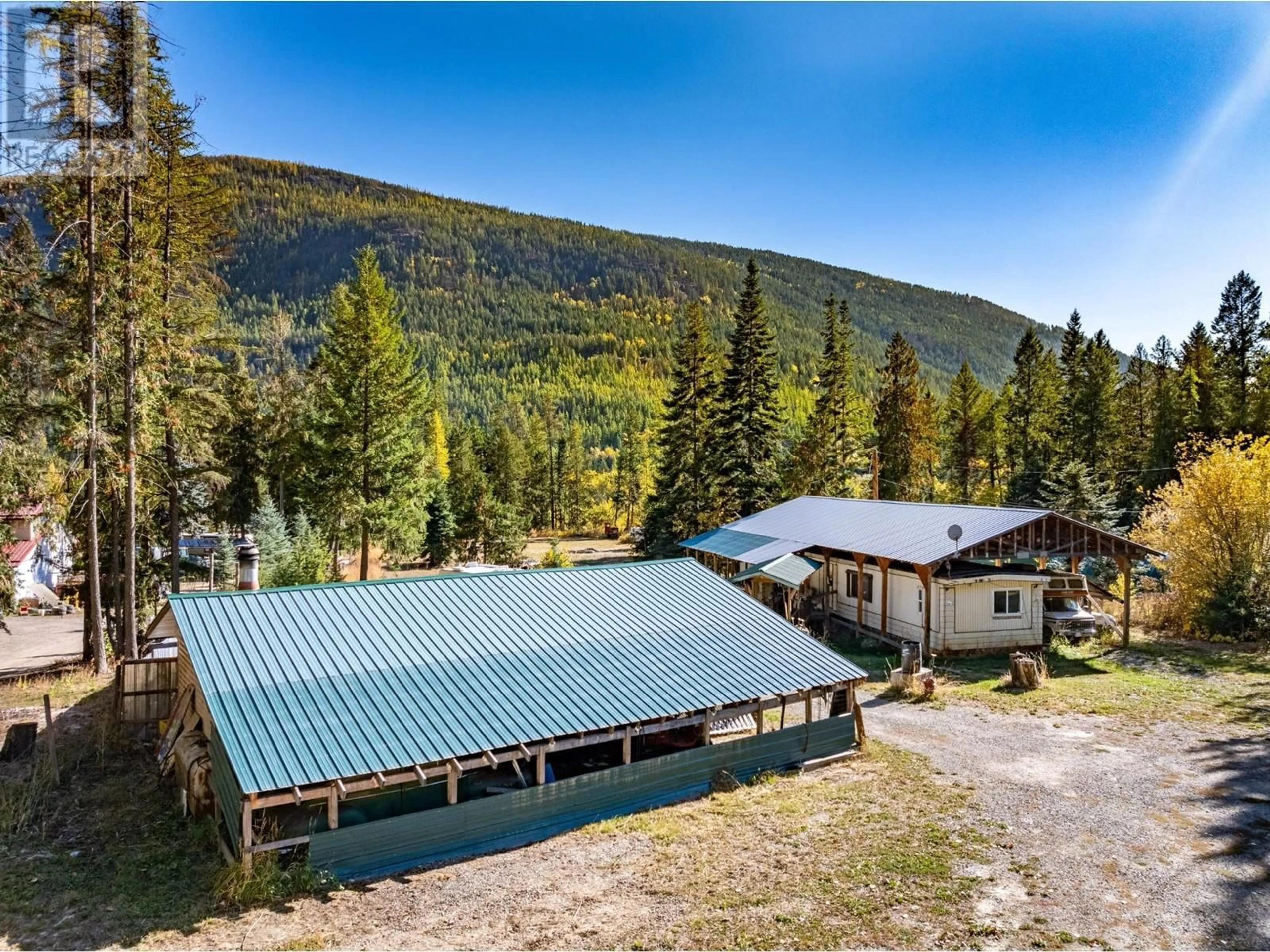 A pic from outside/outdoor area/front of a property/back of a property/a pic from drone, mountain view for 4717 GOAT RIVER NORTH ROAD, Arrow Creek British Columbia V0B1G9