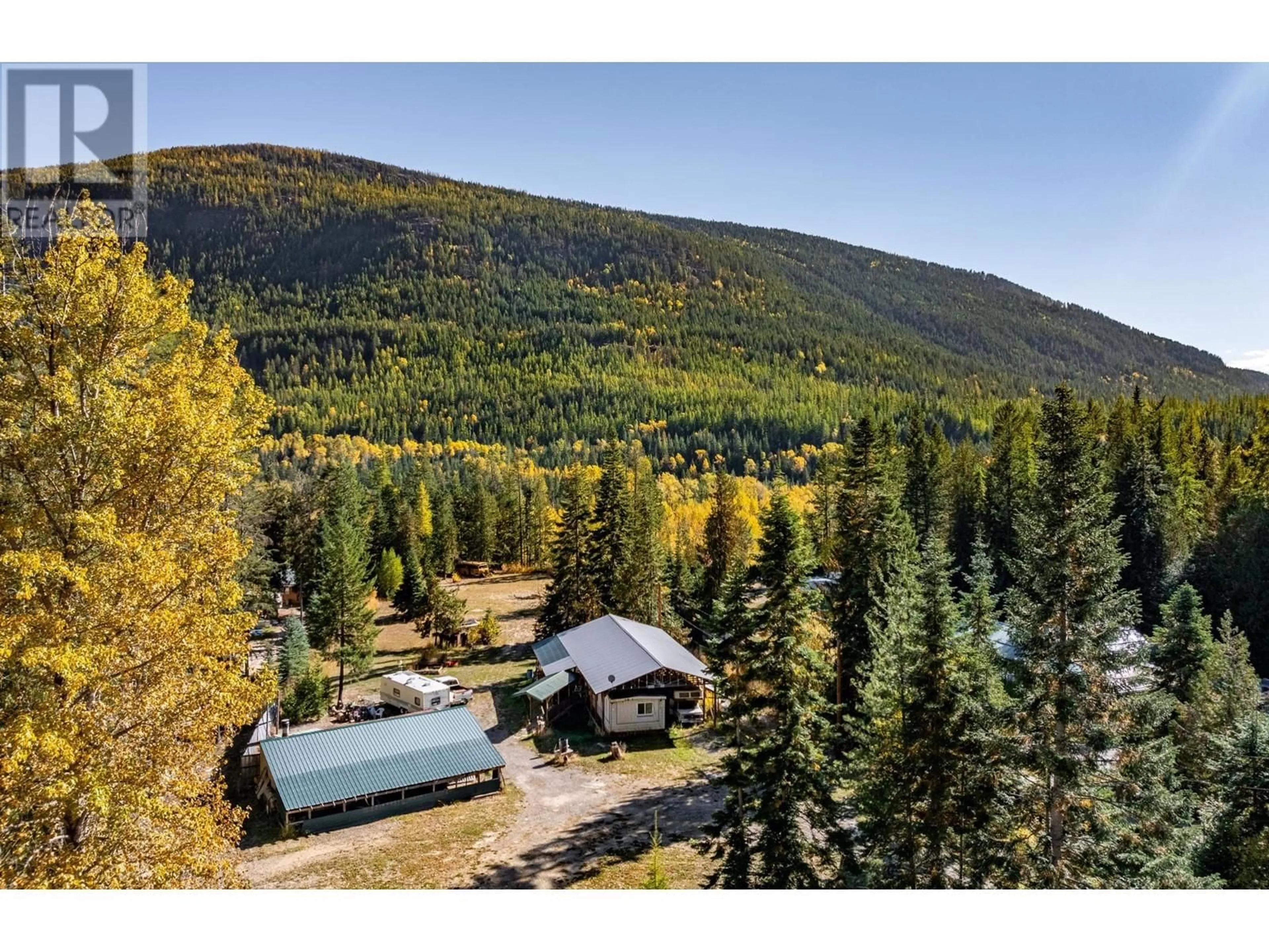 A pic from outside/outdoor area/front of a property/back of a property/a pic from drone, mountain view for 4717 GOAT RIVER NORTH ROAD, Arrow Creek British Columbia V0B1G9
