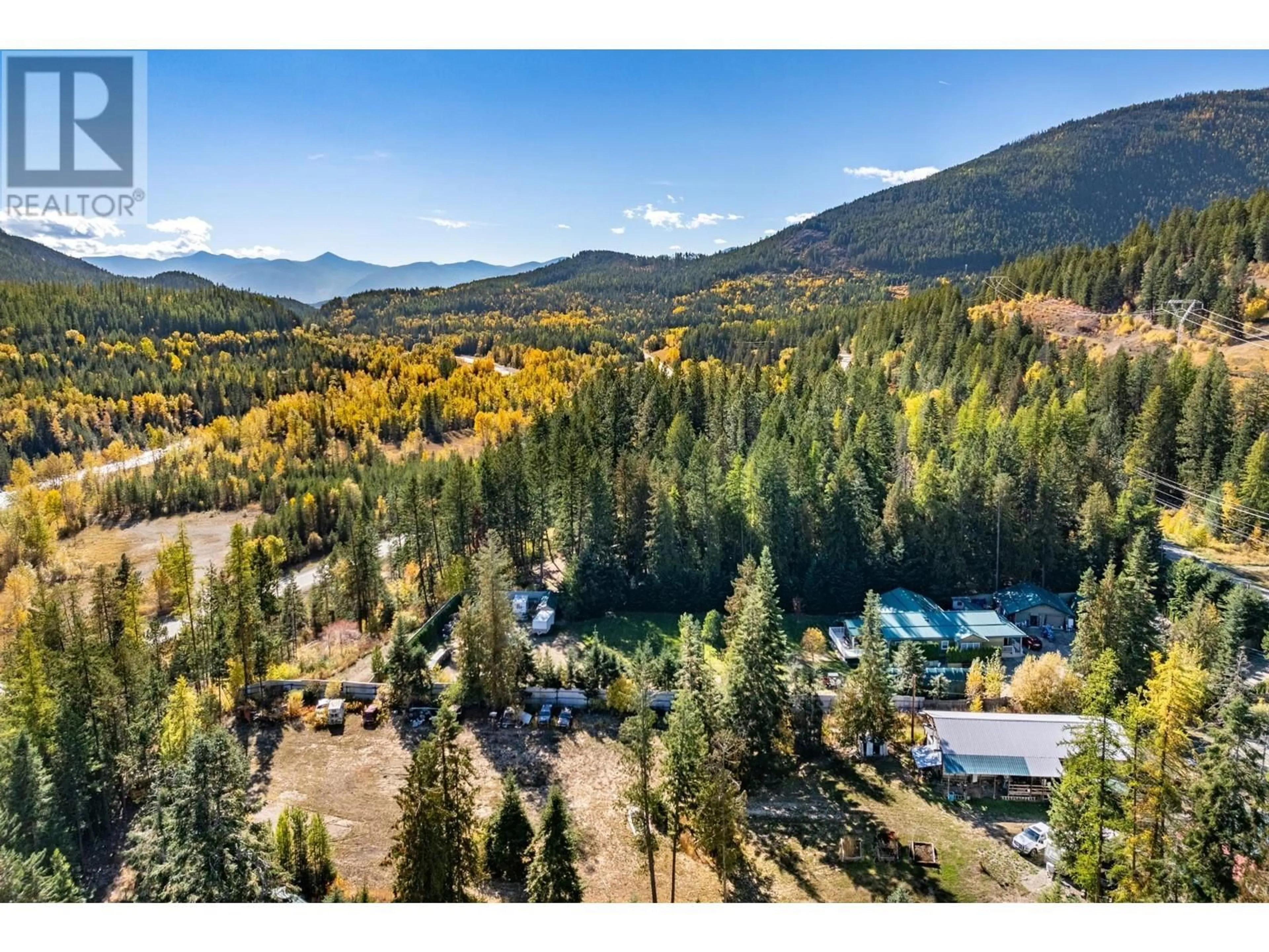 A pic from outside/outdoor area/front of a property/back of a property/a pic from drone, mountain view for 4717 GOAT RIVER NORTH ROAD, Arrow Creek British Columbia V0B1G9