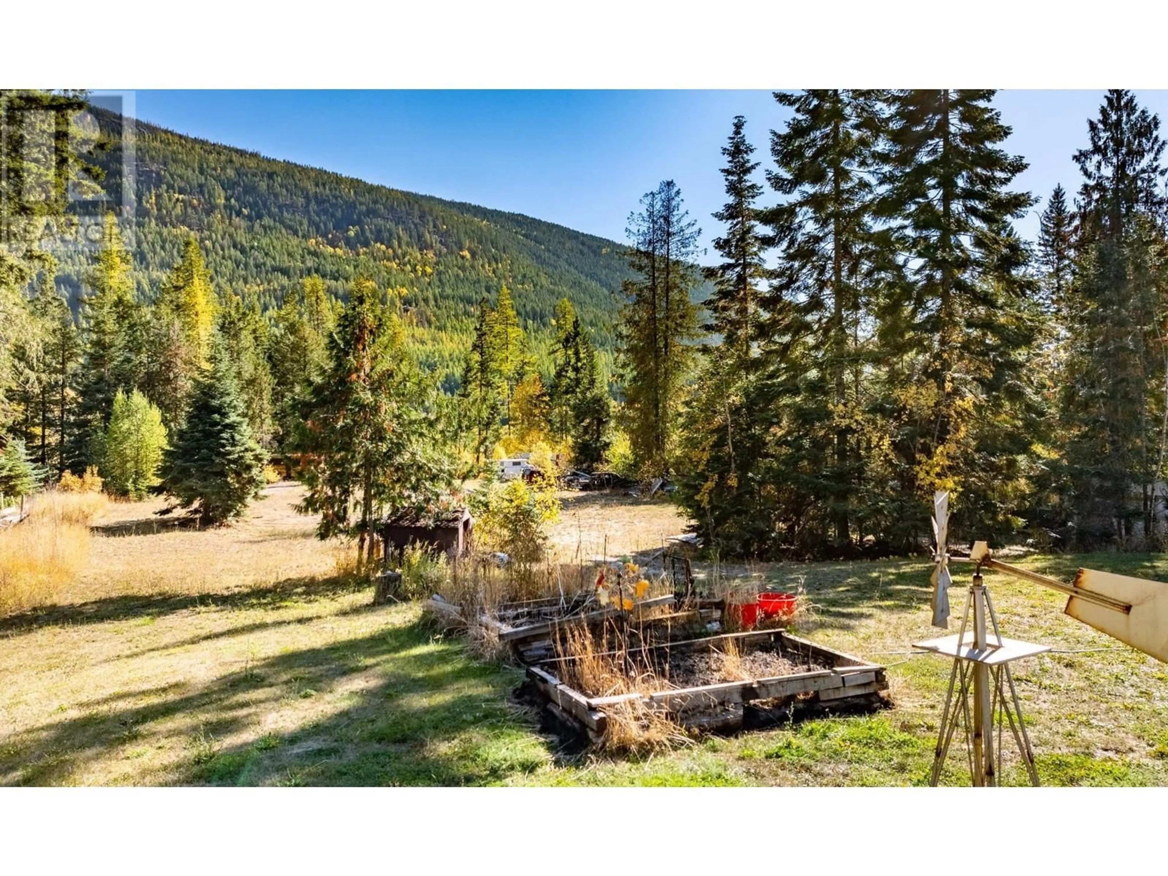 A pic from outside/outdoor area/front of a property/back of a property/a pic from drone, forest/trees view for 4717 GOAT RIVER NORTH ROAD, Arrow Creek British Columbia V0B1G9