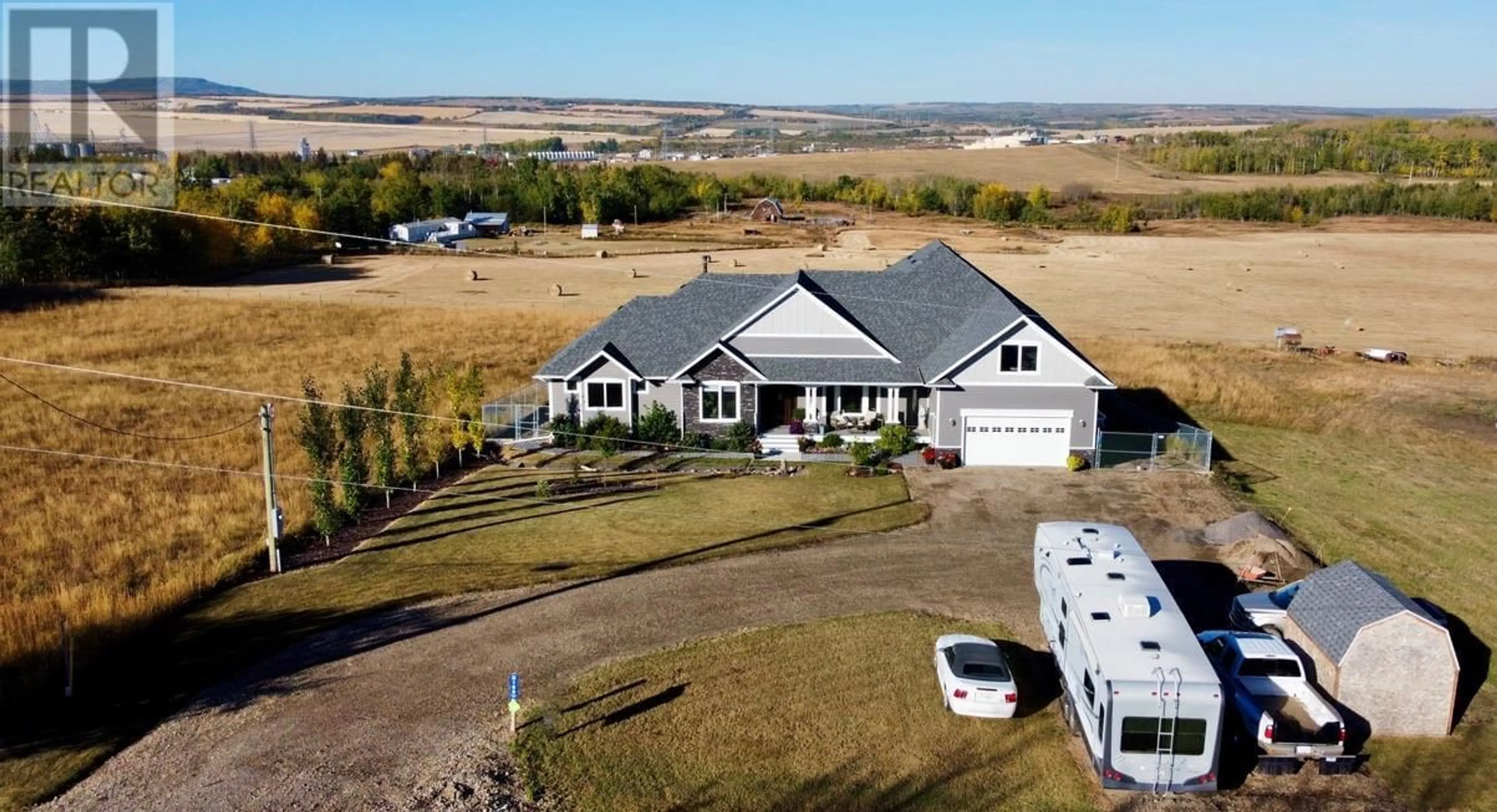 A pic from outside/outdoor area/front of a property/back of a property/a pic from drone, unknown for 8165 HARPER SUBDIVISION OTHER, Dawson Creek British Columbia V1G4E8