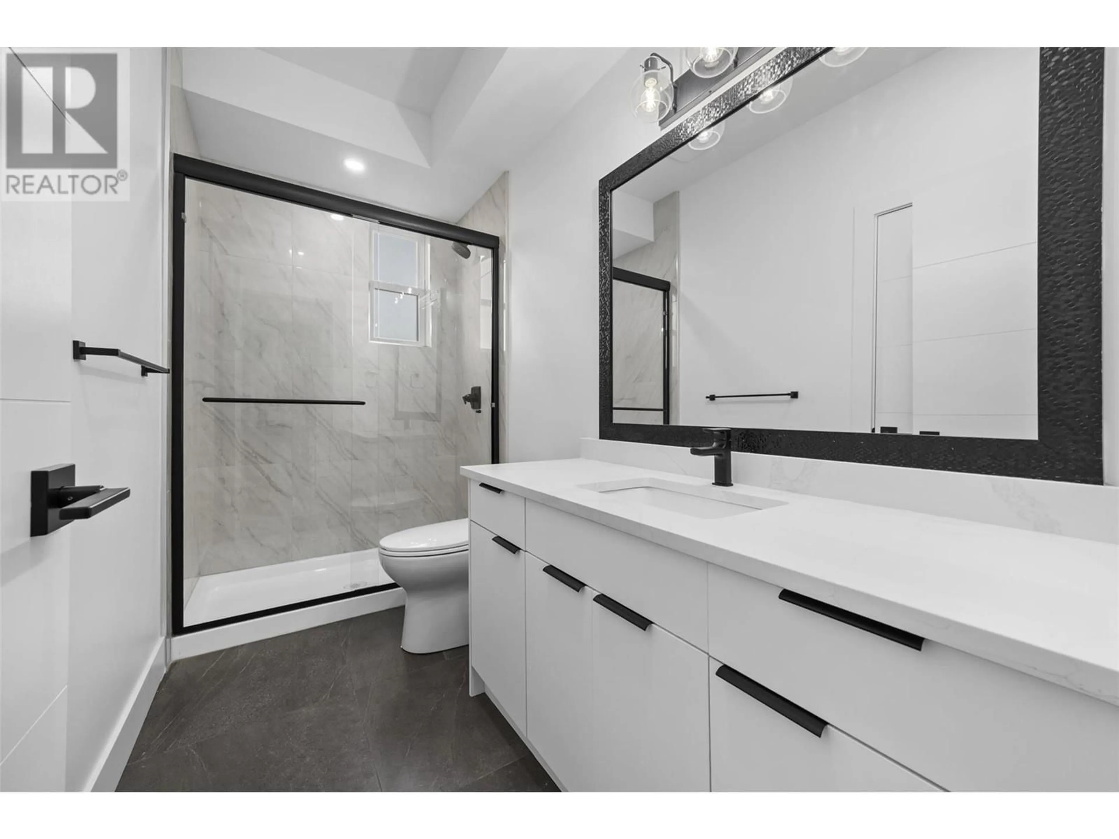 Standard bathroom, ceramic/tile floor for 750 RAYMER AVENUE, Kelowna British Columbia V1Y4Z8