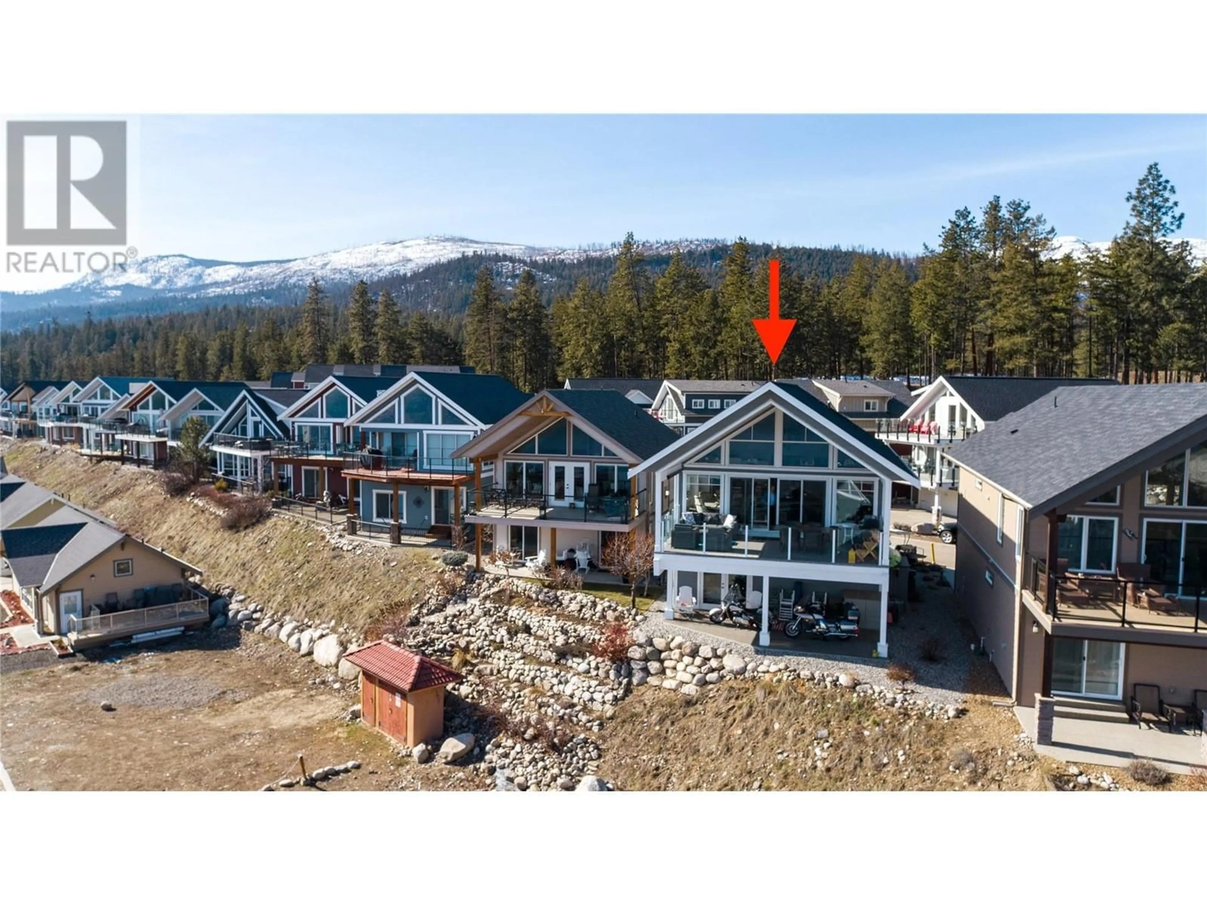 A pic from outside/outdoor area/front of a property/back of a property/a pic from drone, mountain view for 6971 TERAZONA DRIVE, Fintry British Columbia V1Z3R8