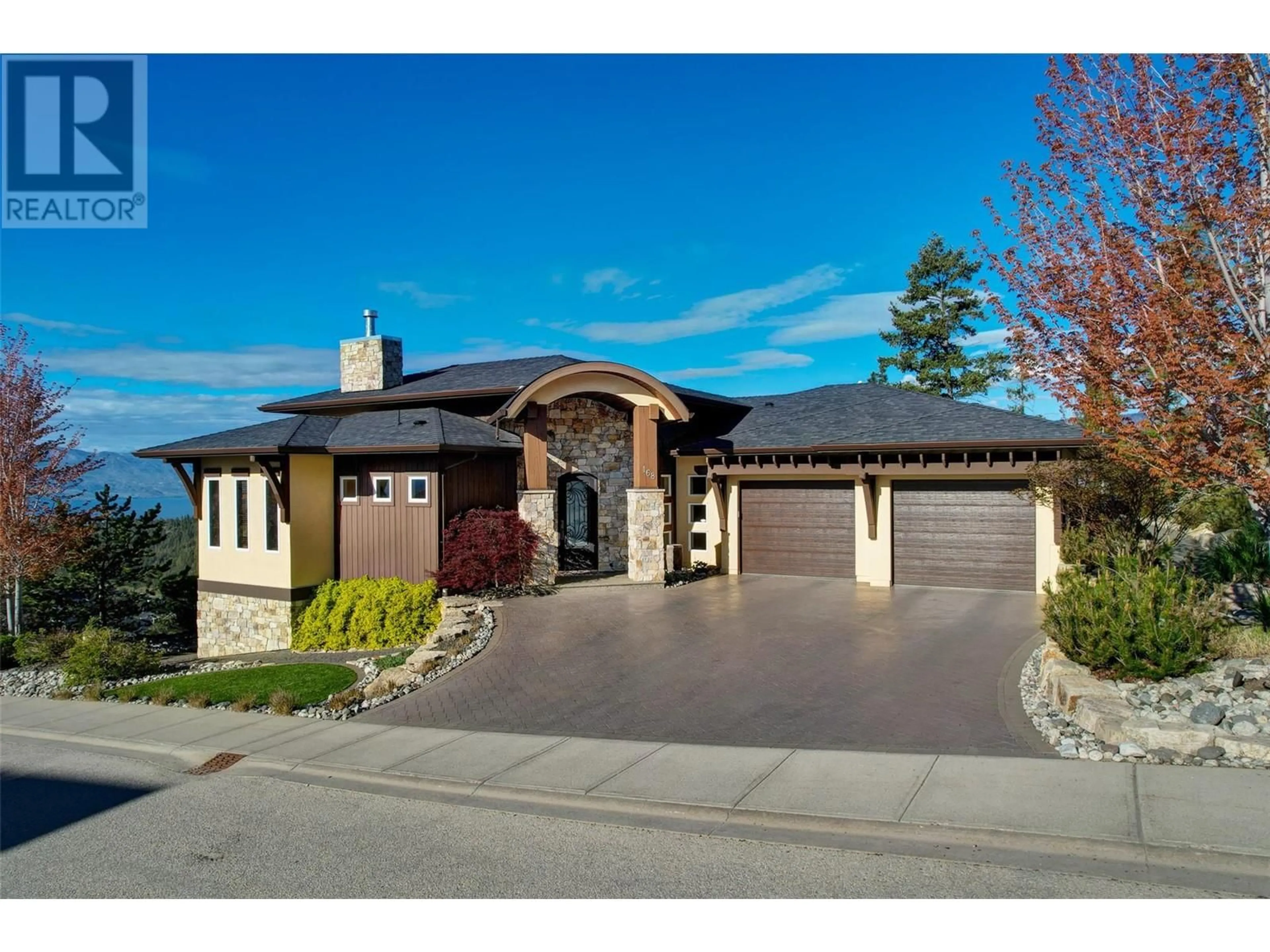 Home with brick exterior material, street for 168 SKYLAND DRIVE, Kelowna British Columbia V1V3A1