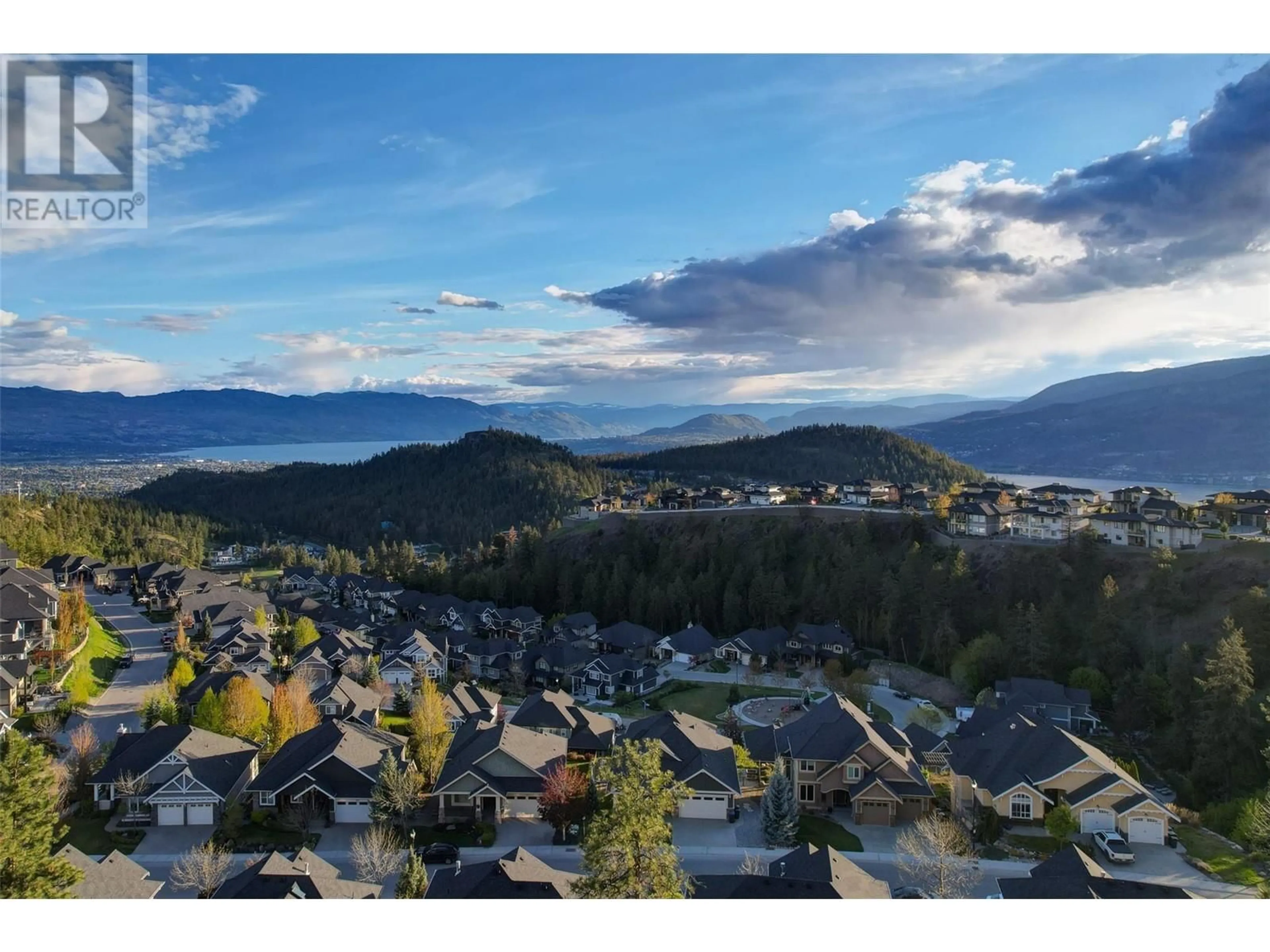 A pic from outside/outdoor area/front of a property/back of a property/a pic from drone, mountain view for 168 SKYLAND DRIVE, Kelowna British Columbia V1V3A1