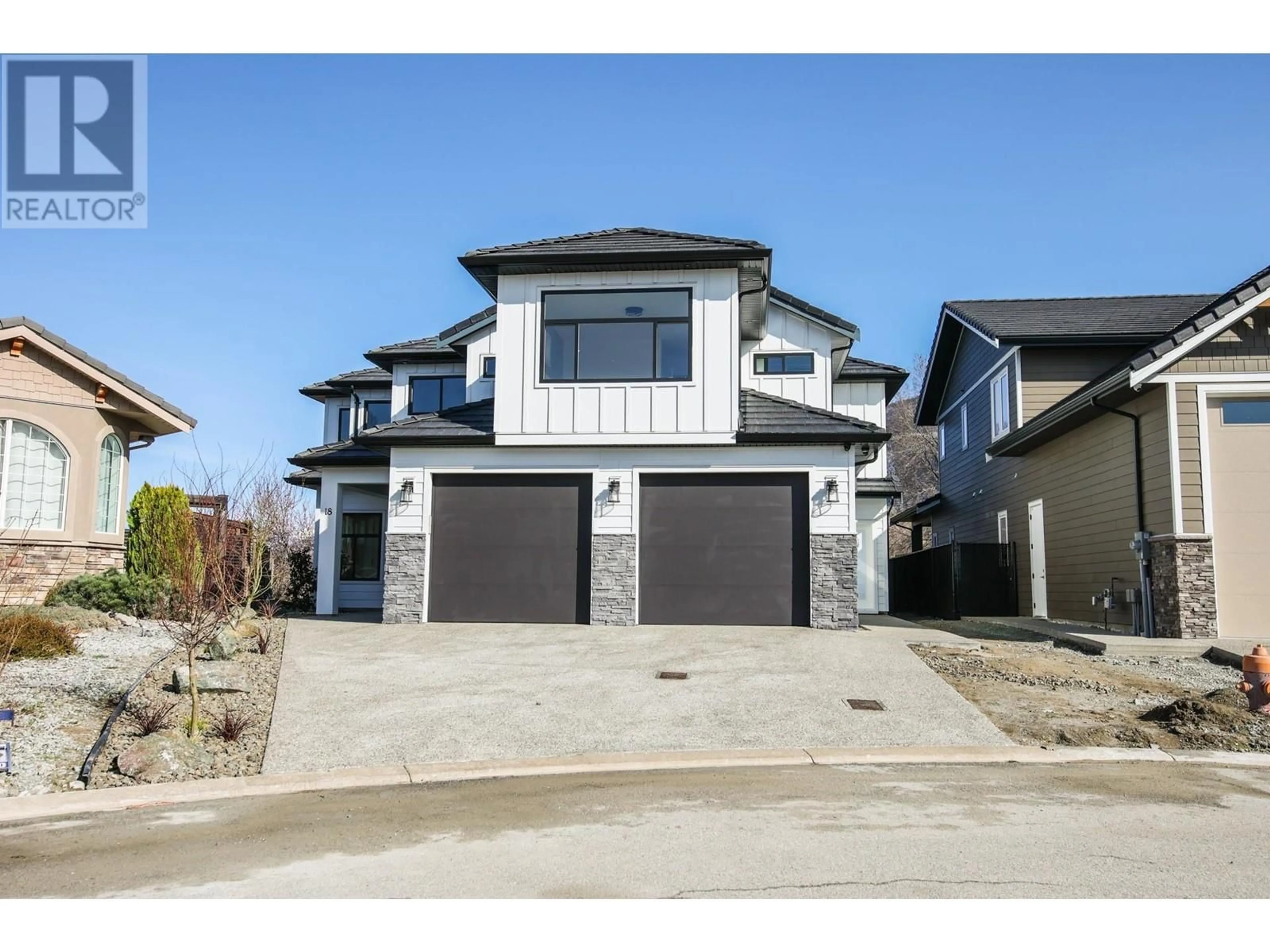 Home with vinyl exterior material, street for 18 CHARDONNAY COURT, Osoyoos British Columbia V0H1V6