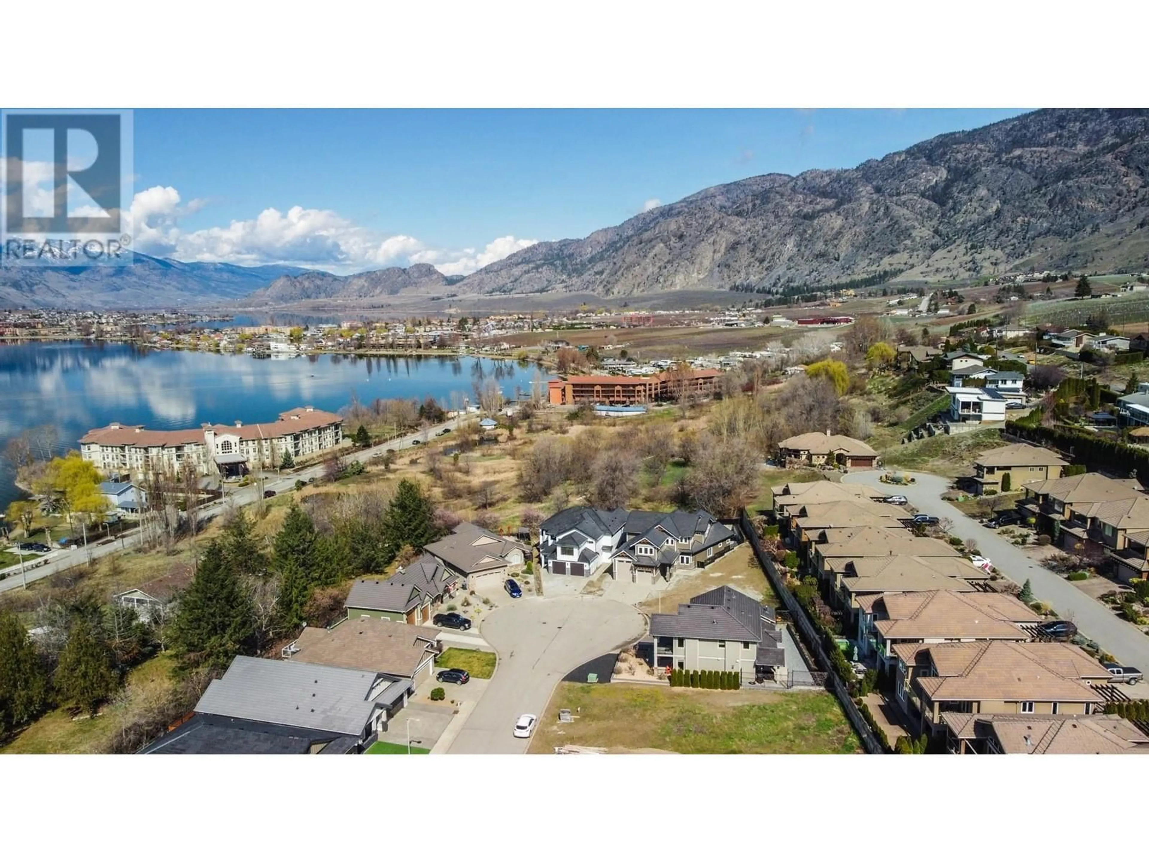 A pic from outside/outdoor area/front of a property/back of a property/a pic from drone, water/lake/river/ocean view for 18 CHARDONNAY COURT, Osoyoos British Columbia V0H1V6