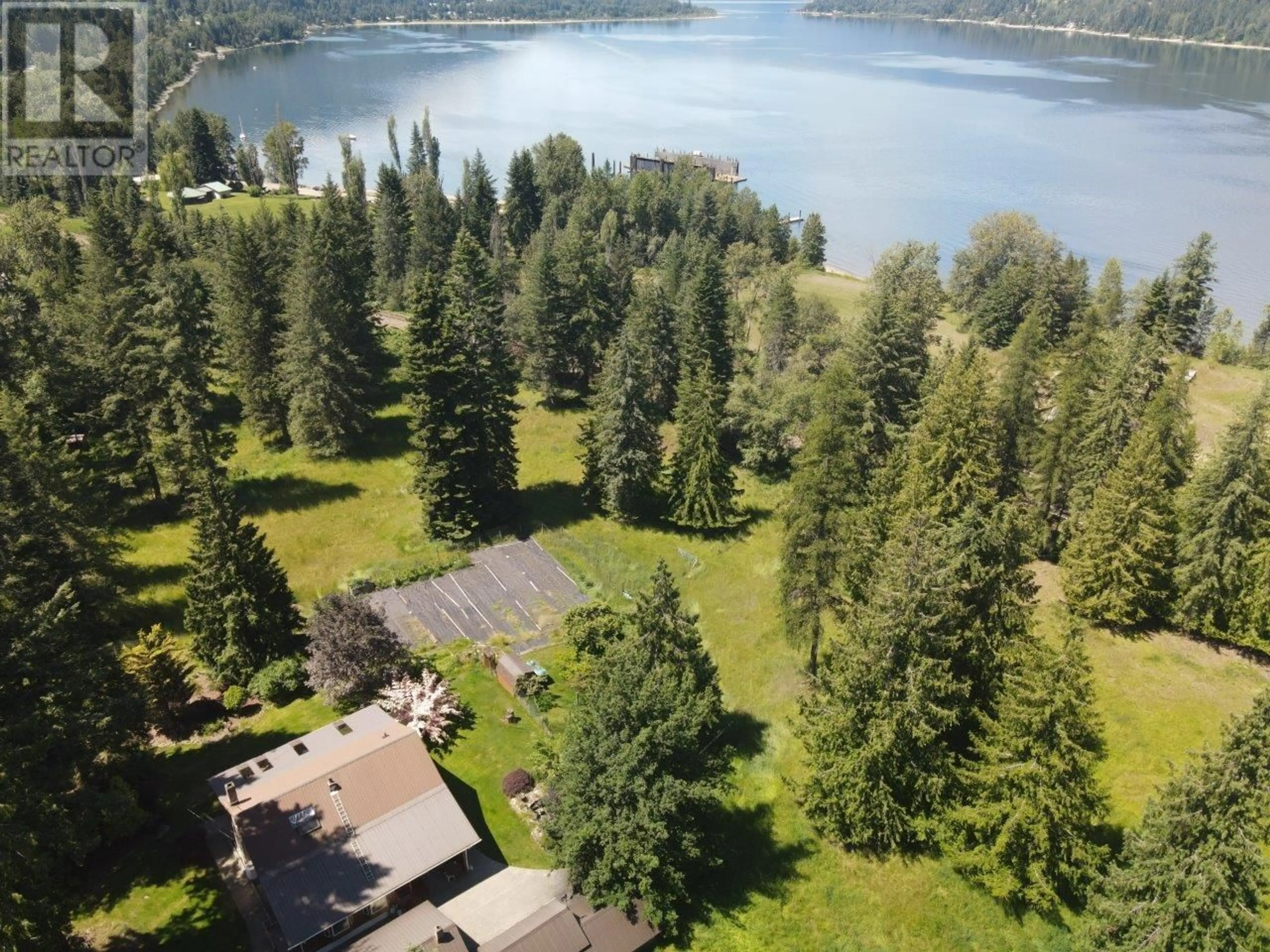 A pic from outside/outdoor area/front of a property/back of a property/a pic from drone, water/lake/river/ocean view for 7047 HARROP-PROCTER ROAD, Harrop British Columbia V1L6R3