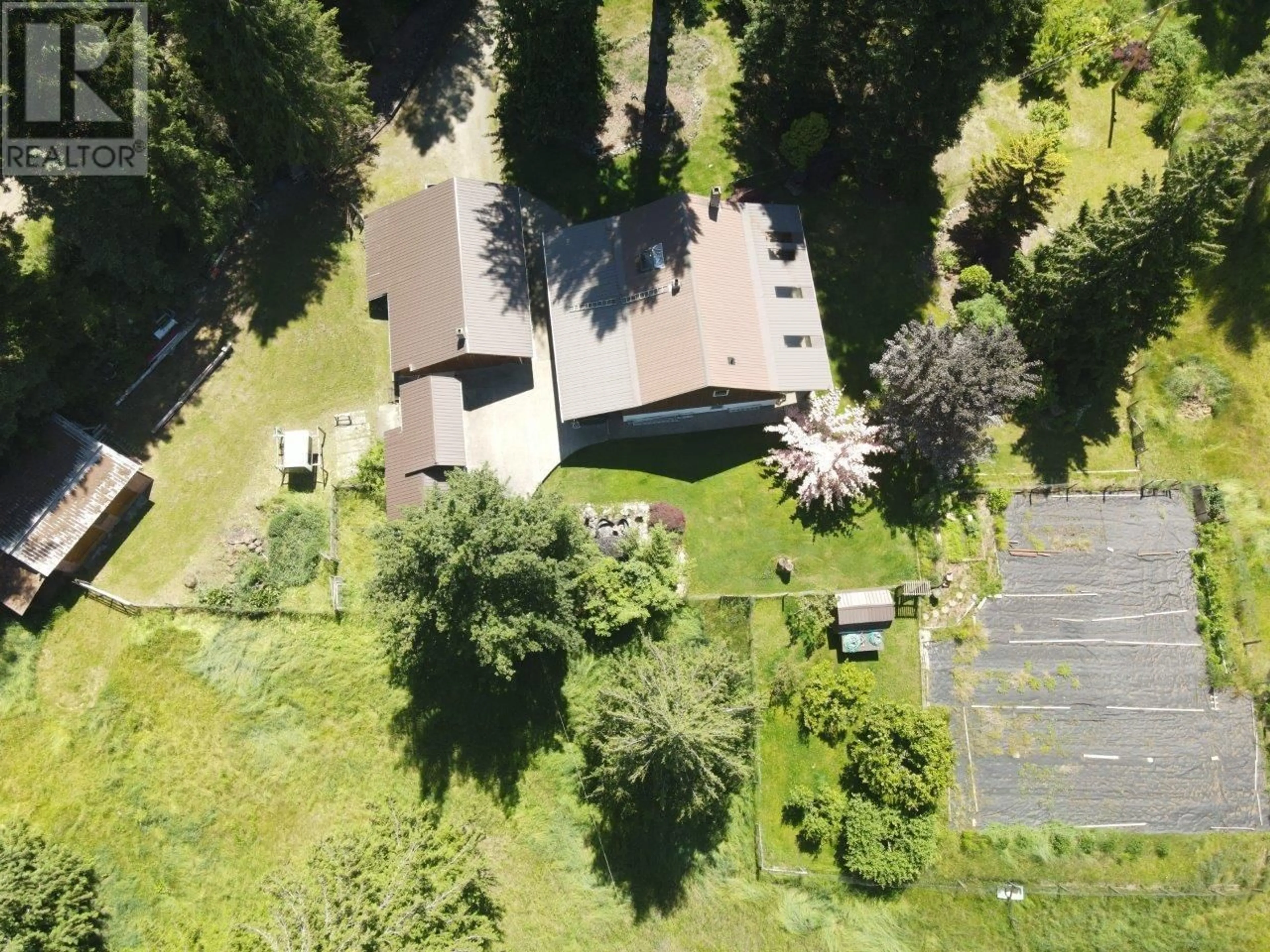 A pic from outside/outdoor area/front of a property/back of a property/a pic from drone, forest/trees view for 7047 HARROP-PROCTER ROAD, Harrop British Columbia V1L6R3