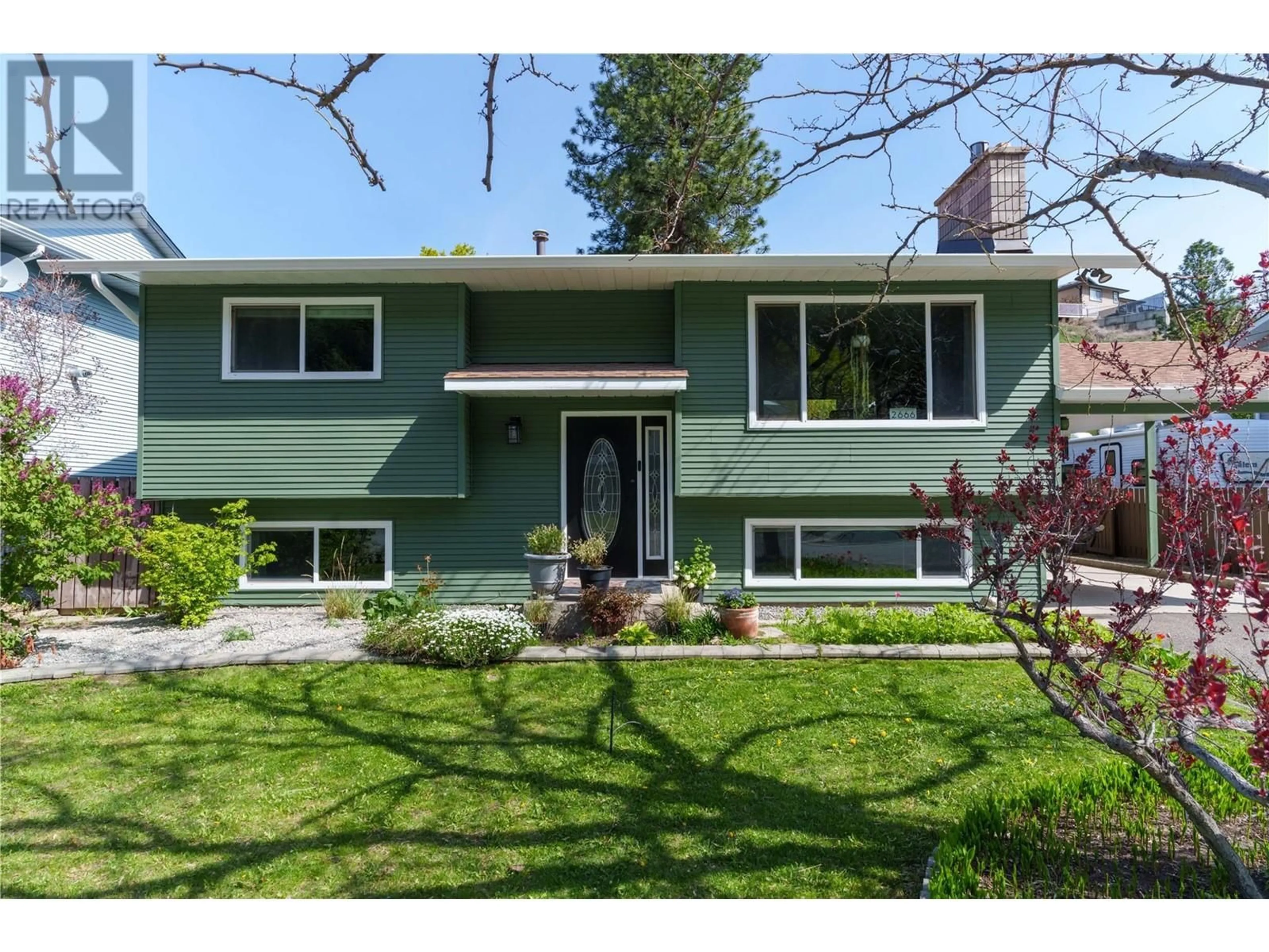 Home with vinyl exterior material, street for 2666 QU'APPELLE BOULEVARD, Kamloops British Columbia V2E2H7