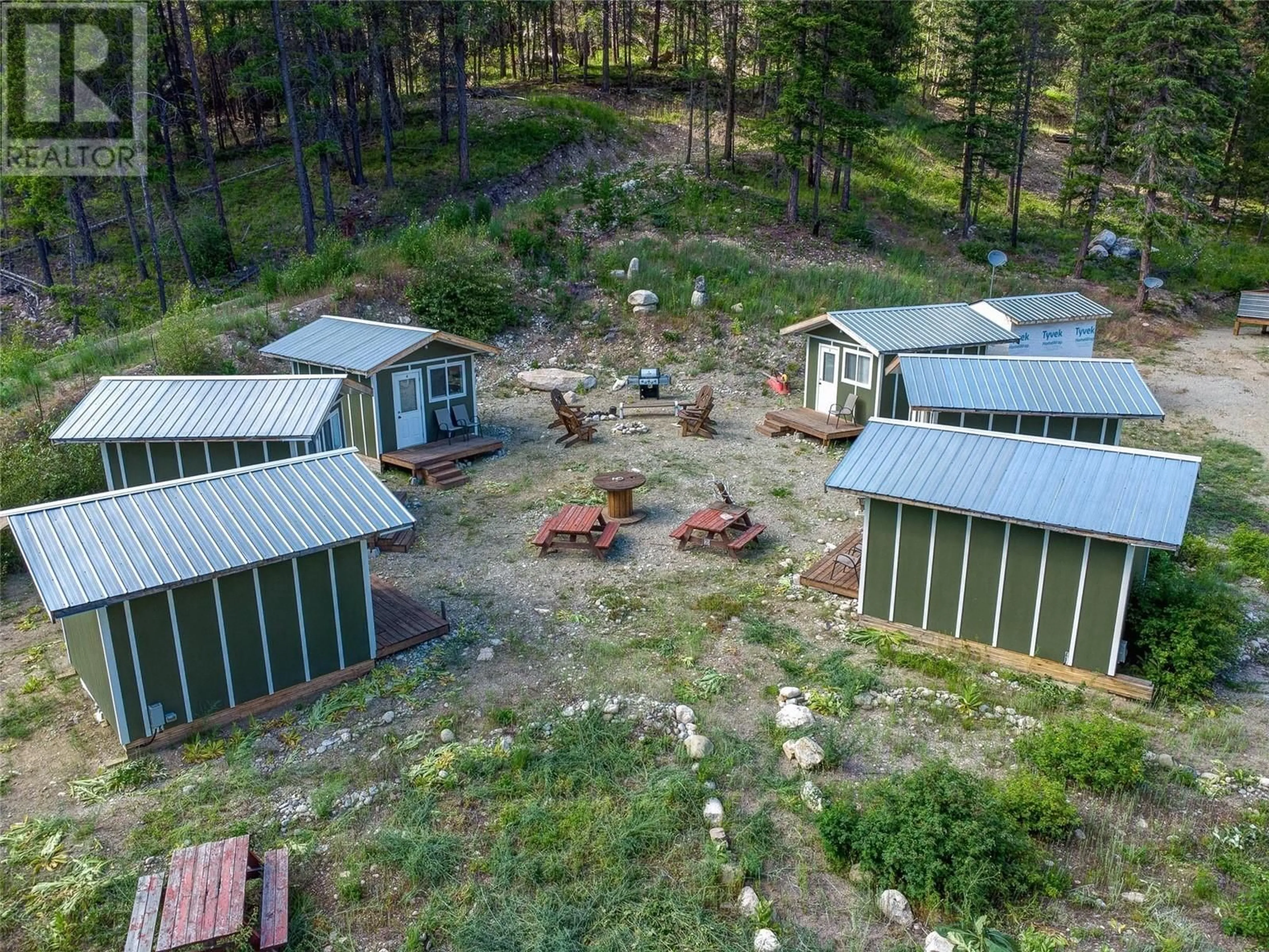 A pic from outside/outdoor area/front of a property/back of a property/a pic from drone, forest/trees view for 4820 HIGHWAY 33 OTHER, Beaverdell British Columbia V0H1A0