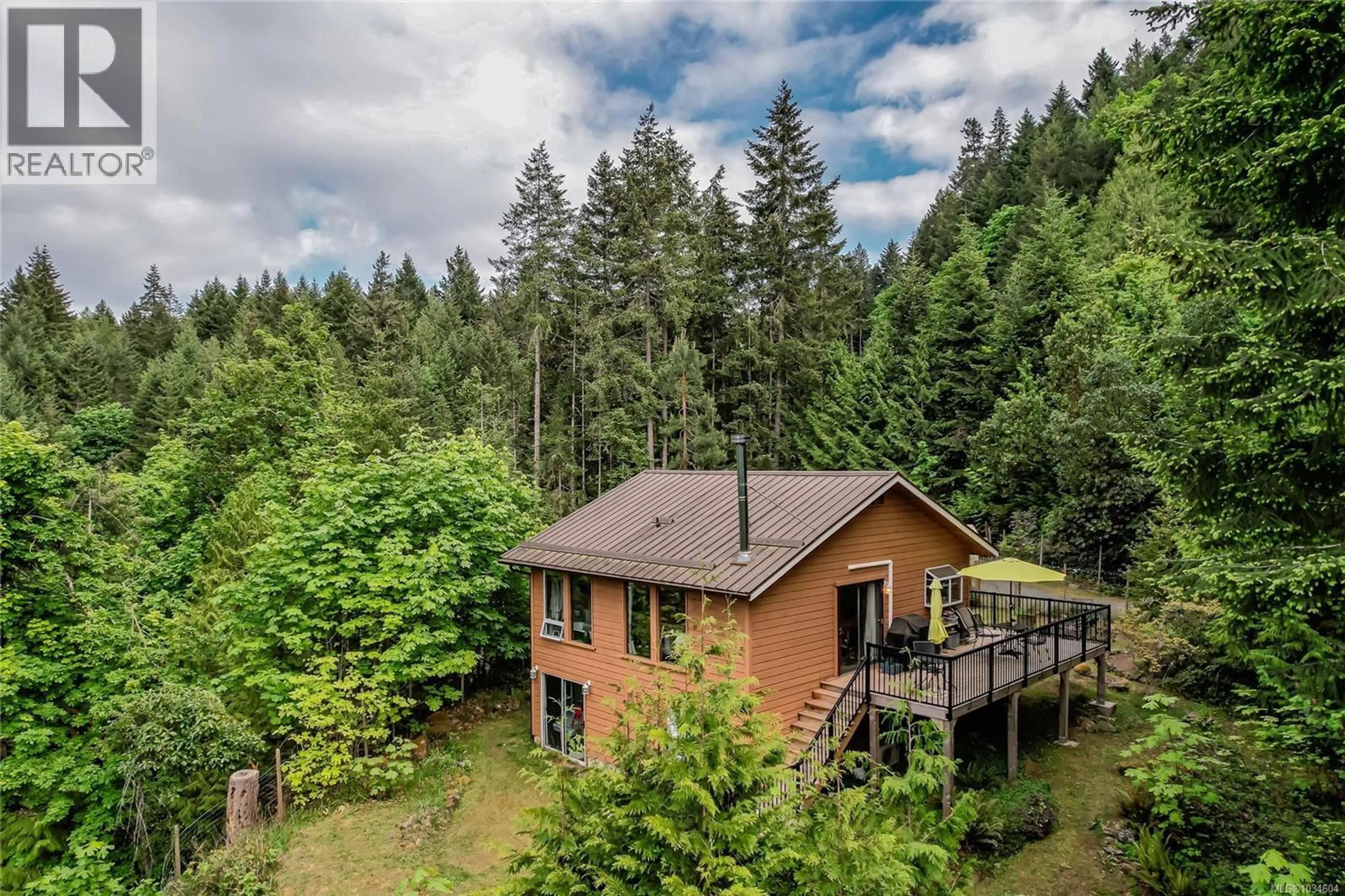 A pic from outside/outdoor area/front of a property/back of a property/a pic from drone, forest/trees view for 262 NORTH VIEW PLACE, Salt Spring British Columbia V8K1A9