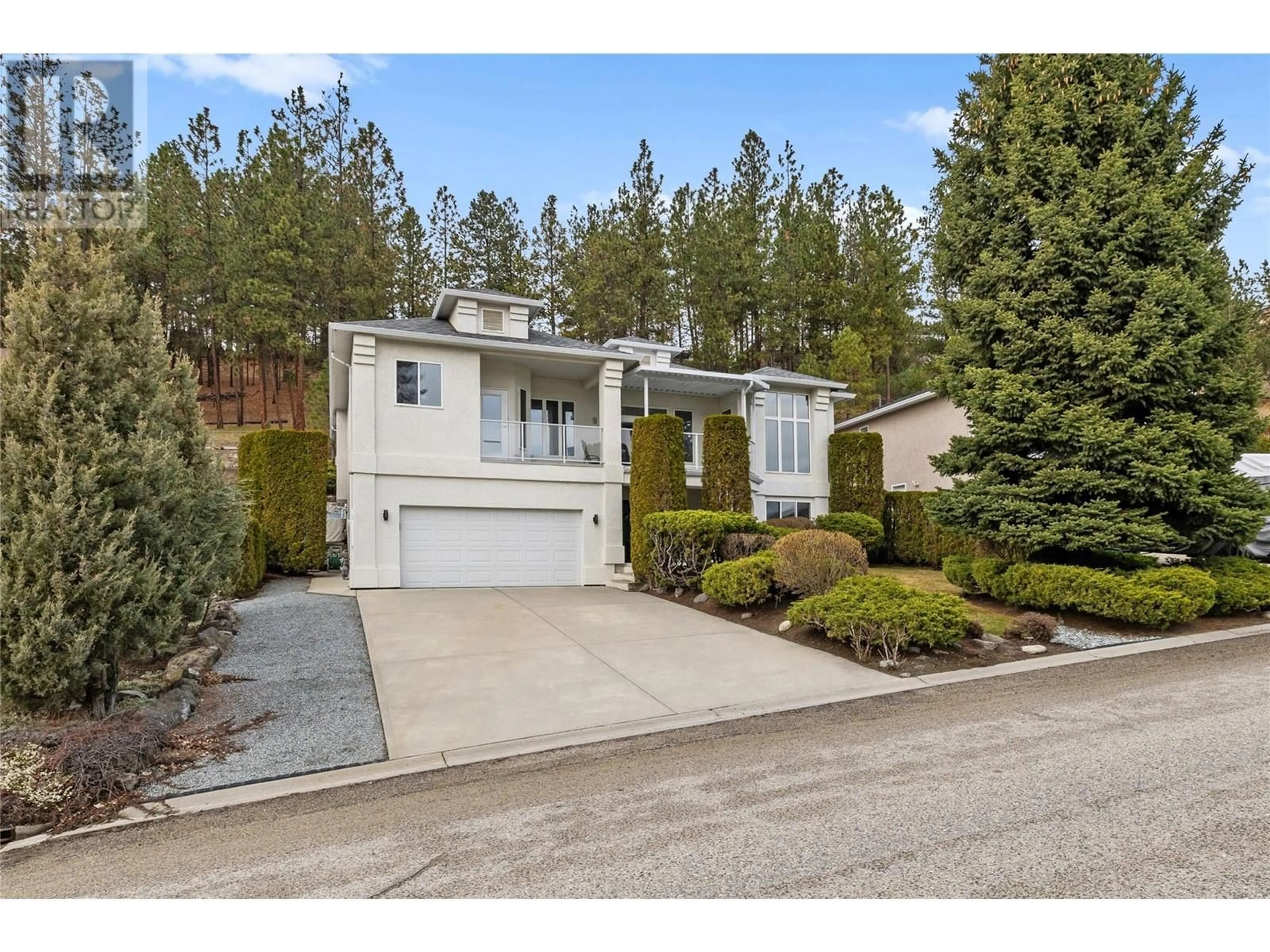 Home with vinyl exterior material, street for 1116 CALEDONIA WAY, West Kelowna British Columbia V1Z3N7