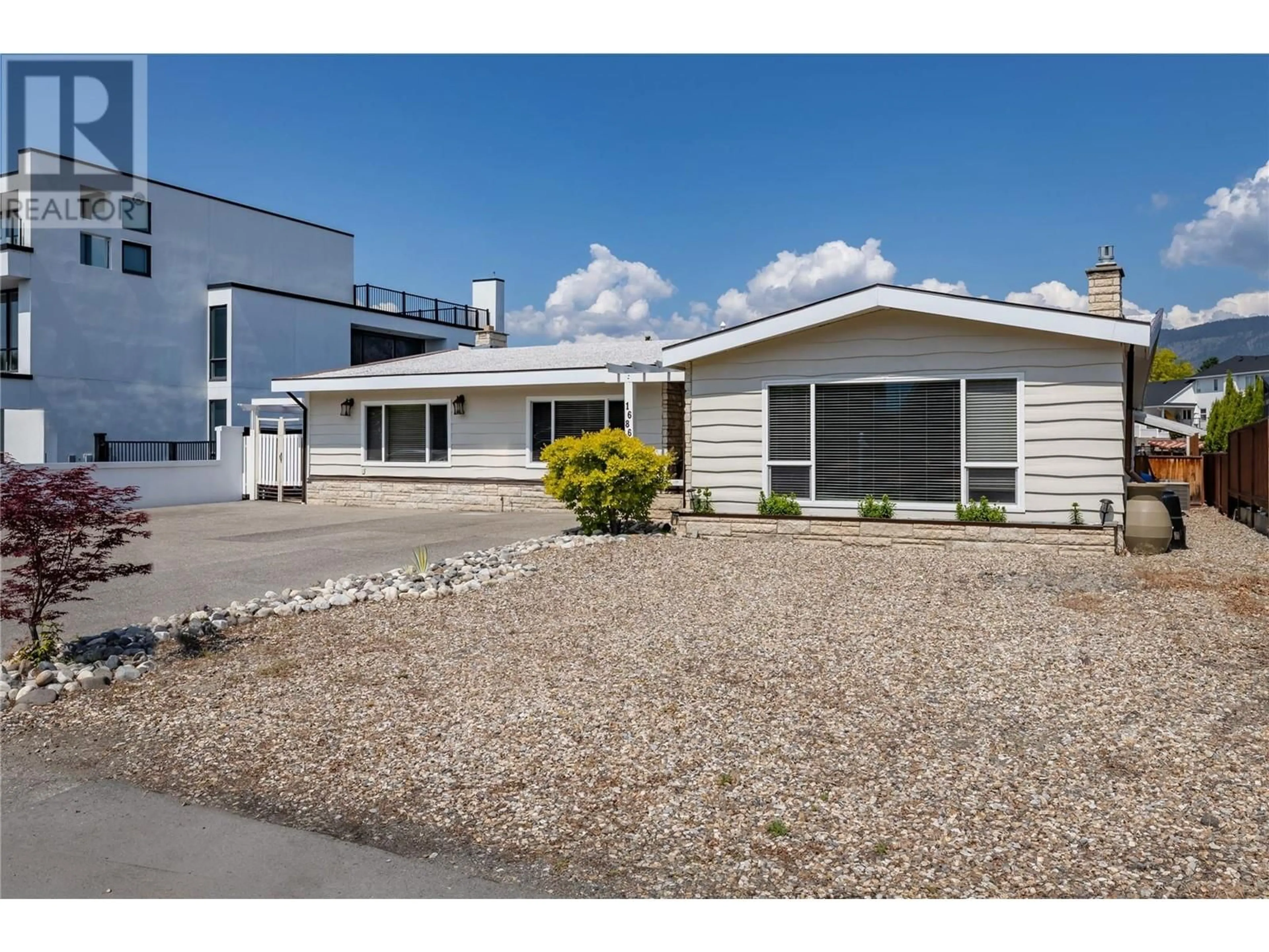 Home with vinyl exterior material, street for 1686 PRITCHARD DRIVE, West Kelowna British Columbia V4T1X5