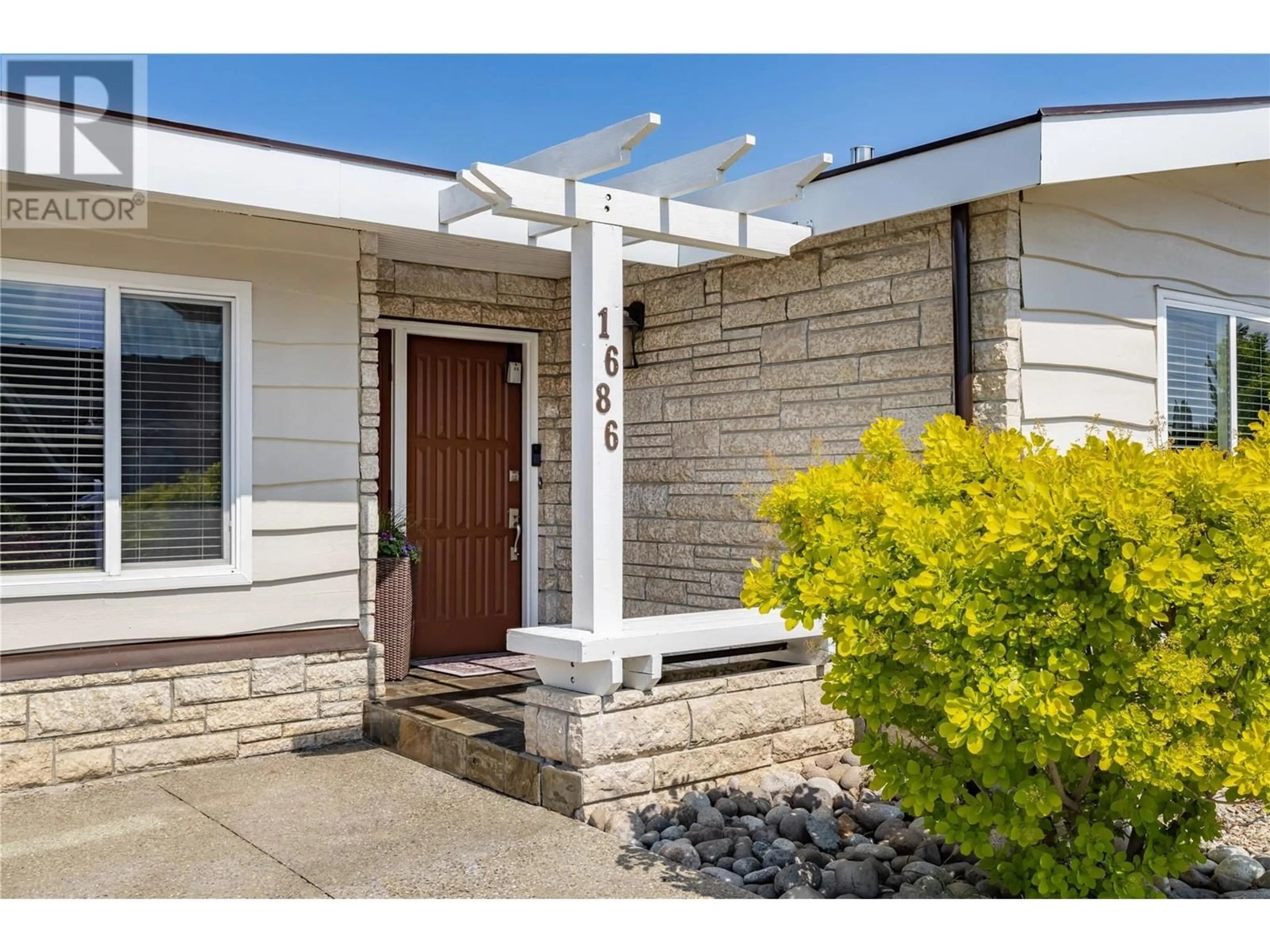 Home with vinyl exterior material, street for 1686 PRITCHARD DRIVE, West Kelowna British Columbia V4T1X5