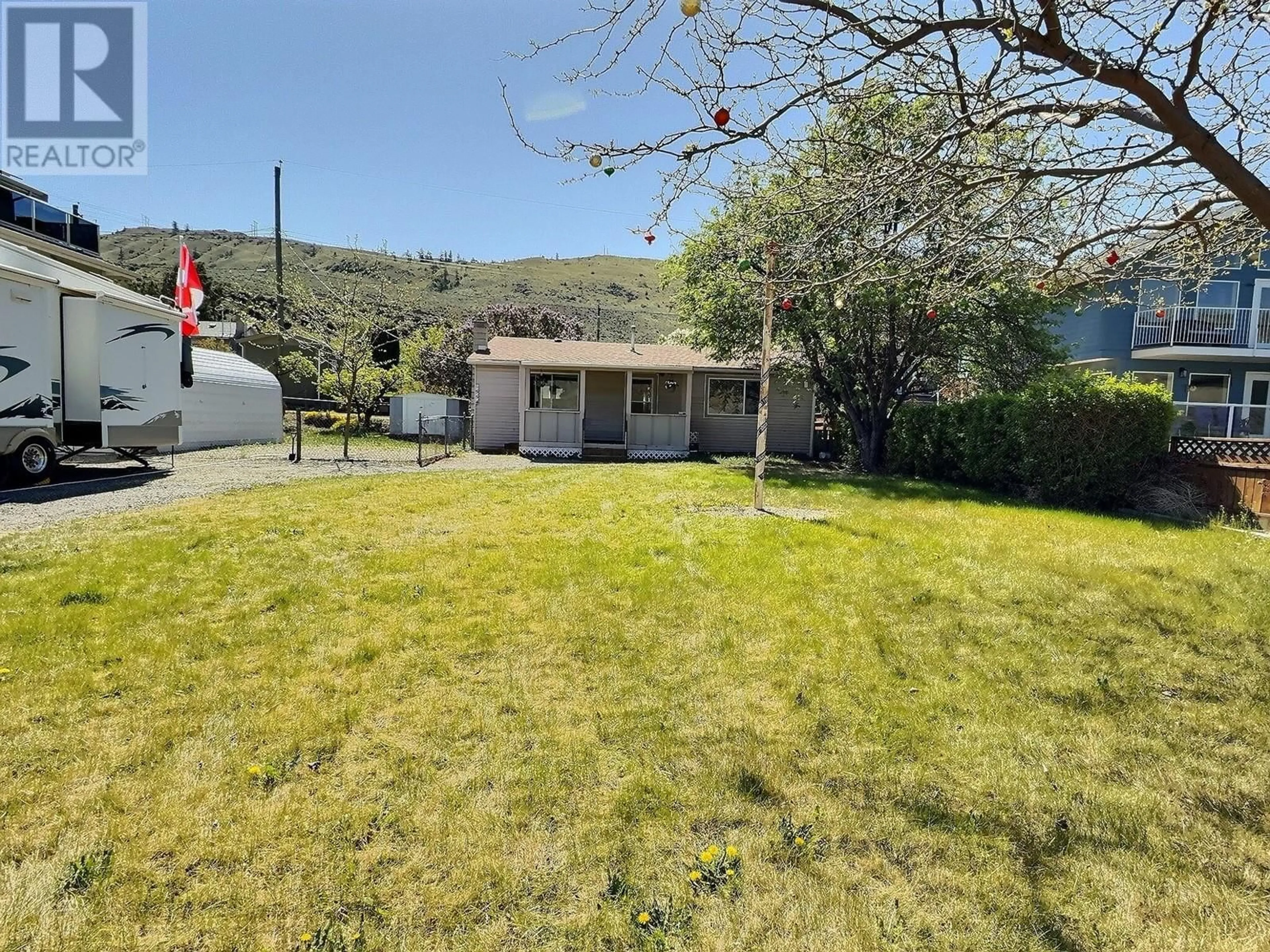 A pic from outside/outdoor area/front of a property/back of a property/a pic from drone, street for 6554 BUIE STREET, Kamloops British Columbia V0k2J0