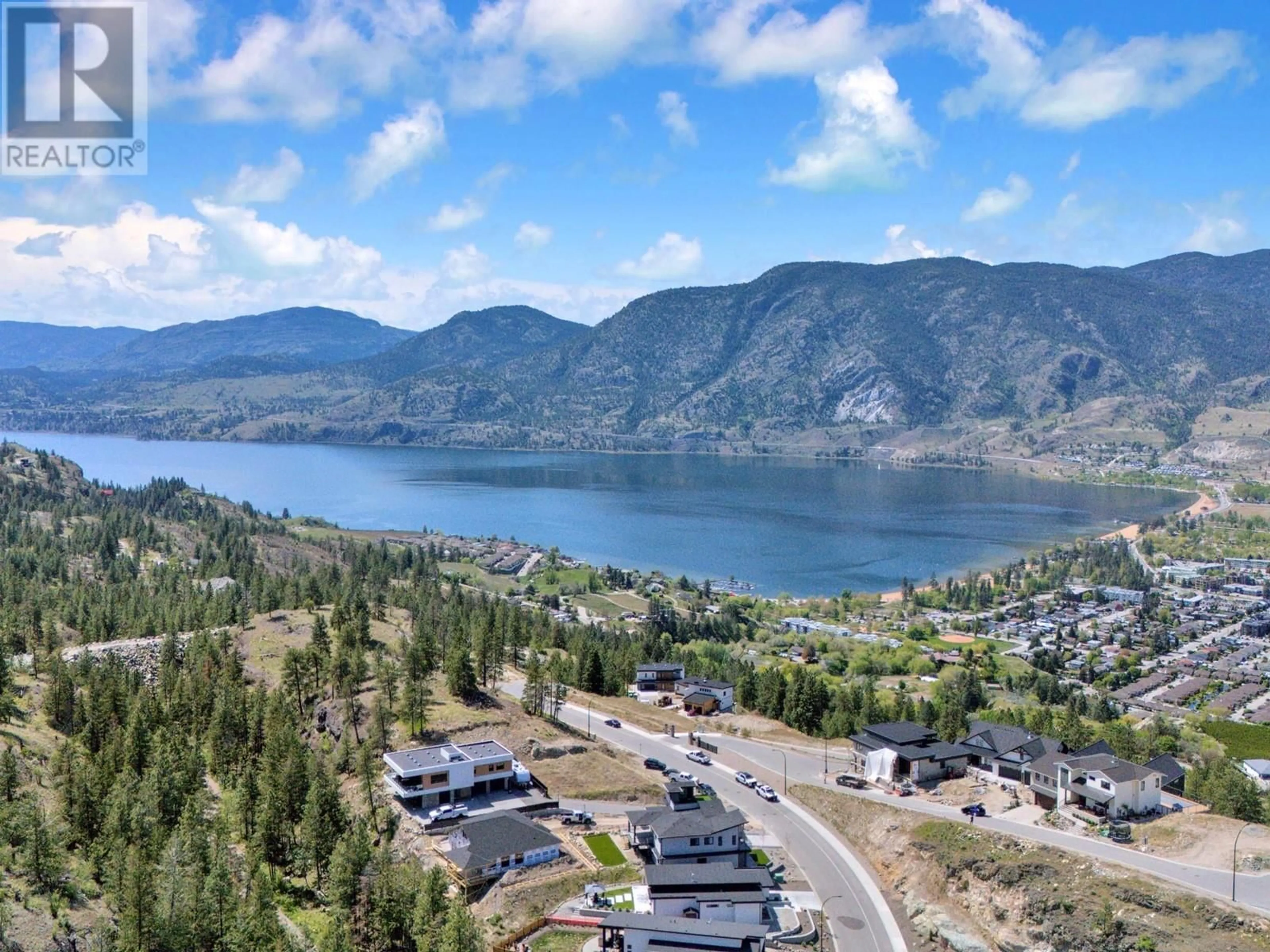 A pic from outside/outdoor area/front of a property/back of a property/a pic from drone, mountain view for 106 - 3331 EVERGREEN DRIVE, Penticton British Columbia V2A0J3
