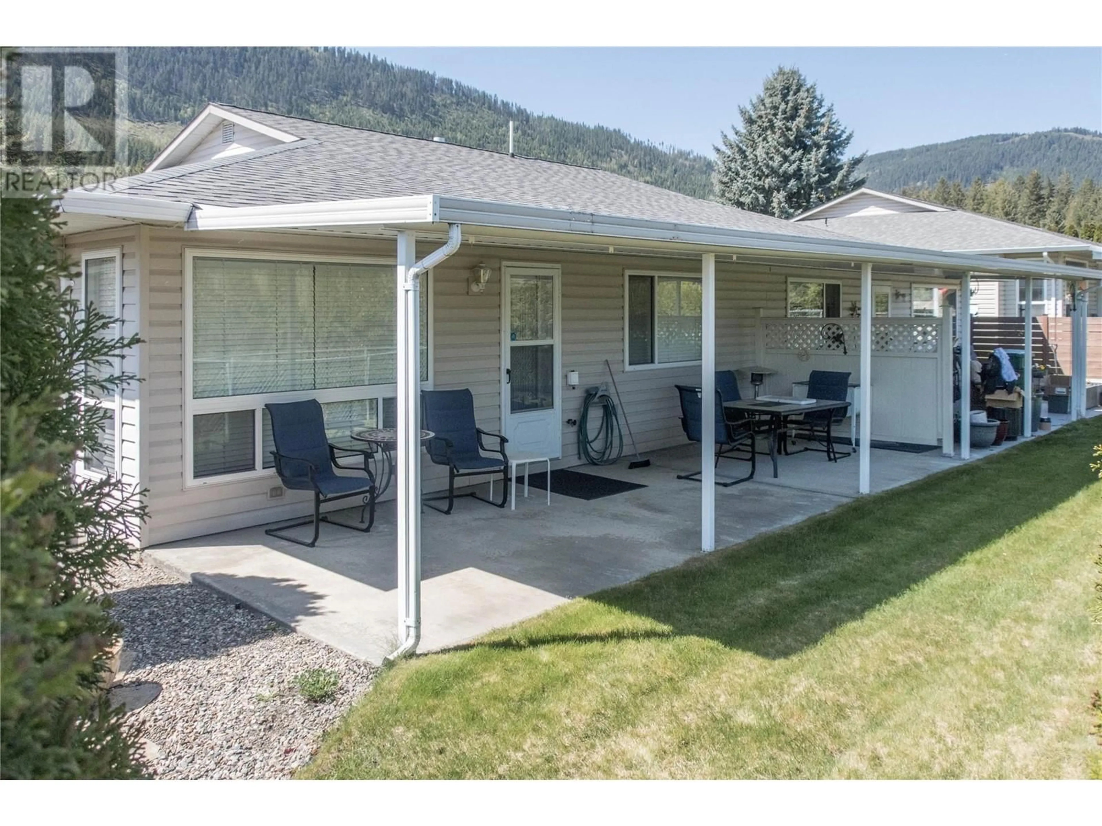 Home with vinyl exterior material, mountain view for 4 - 2675 PINE AVENUE, Lumby British Columbia V0E2G5