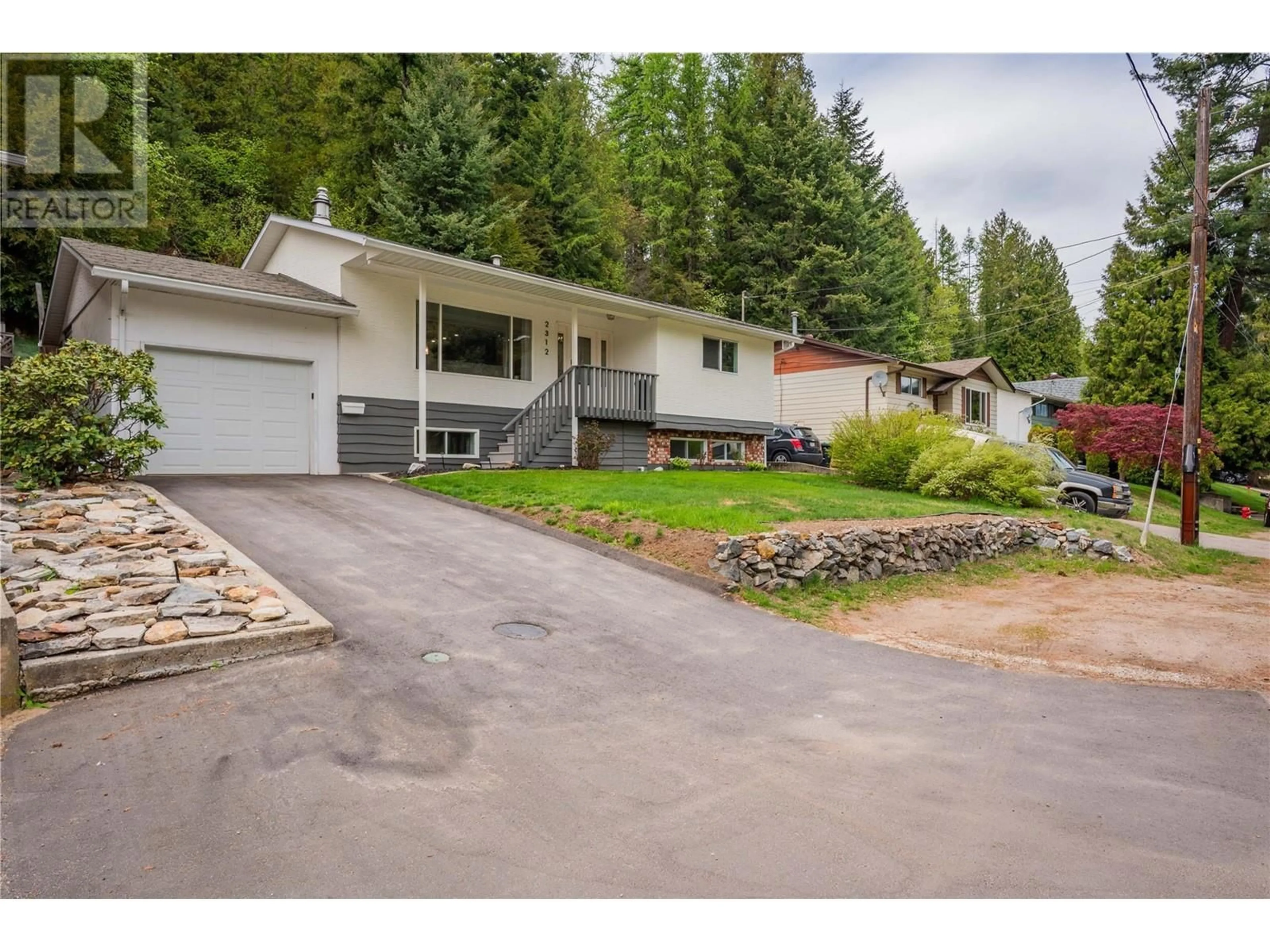 A pic from outside/outdoor area/front of a property/back of a property/a pic from drone, mountain view for 2312 11TH AVENUE, Castlegar British Columbia V1N3A6