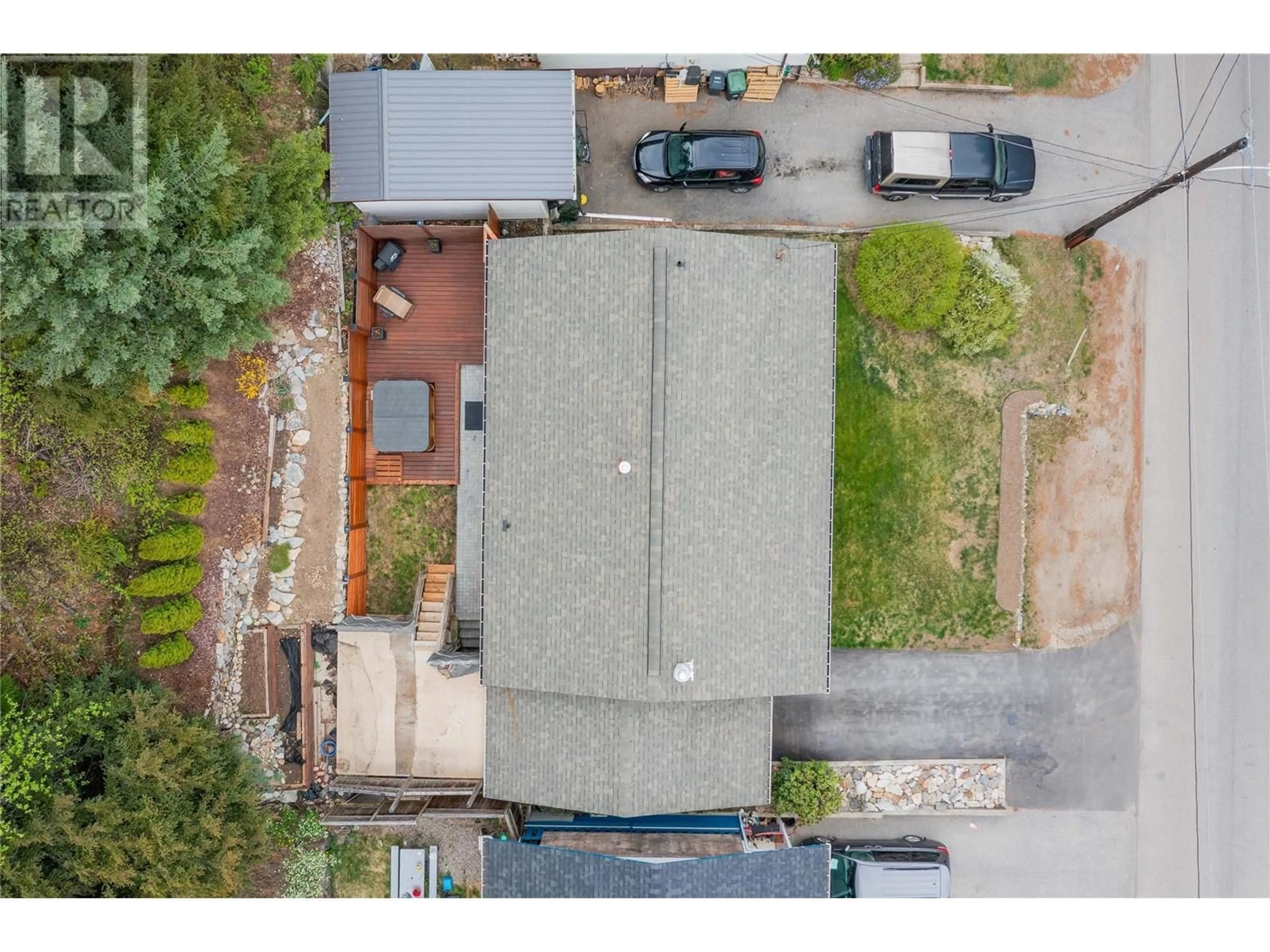 A pic from outside/outdoor area/front of a property/back of a property/a pic from drone, street for 2312 11TH AVENUE, Castlegar British Columbia V1N3A6