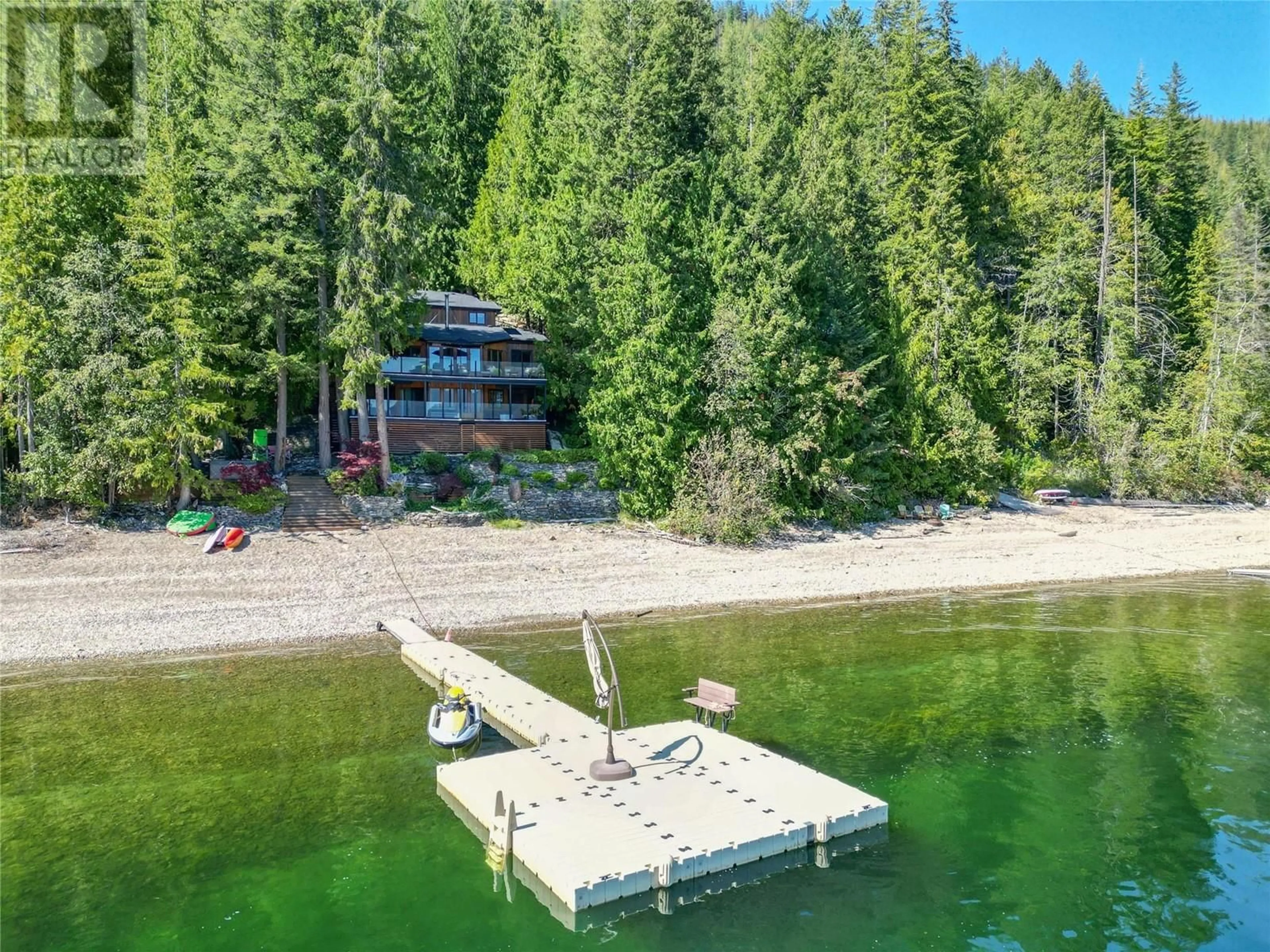A pic from outside/outdoor area/front of a property/back of a property/a pic from drone, water/lake/river/ocean view for 7302 SUNNYBRAE CANOE POINT ROAD, Tappen British Columbia V0E2X1
