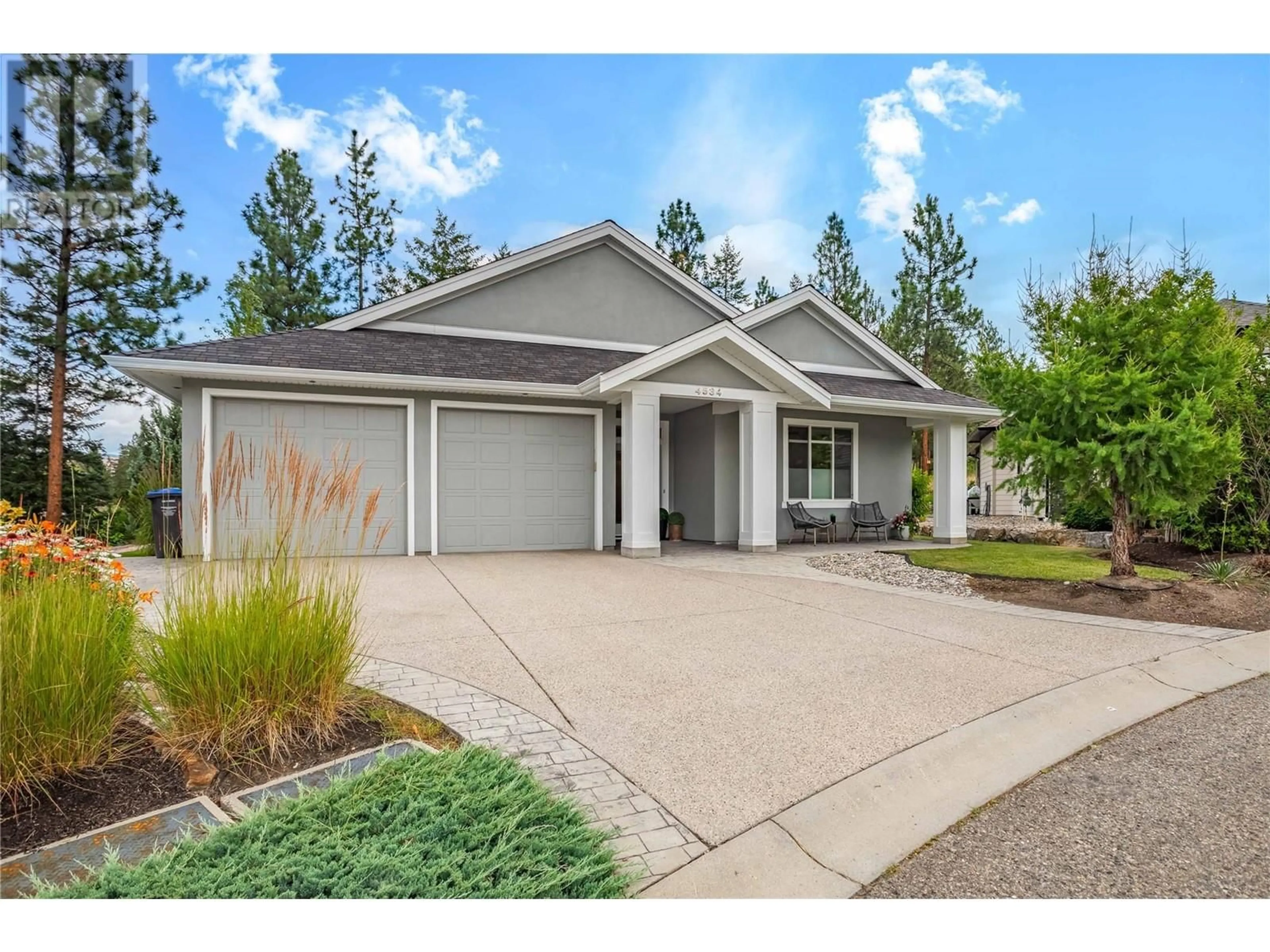 Home with vinyl exterior material, street for 4534 GALLAGHERS EDGEWOOD COURT, Kelowna British Columbia V1W5B6