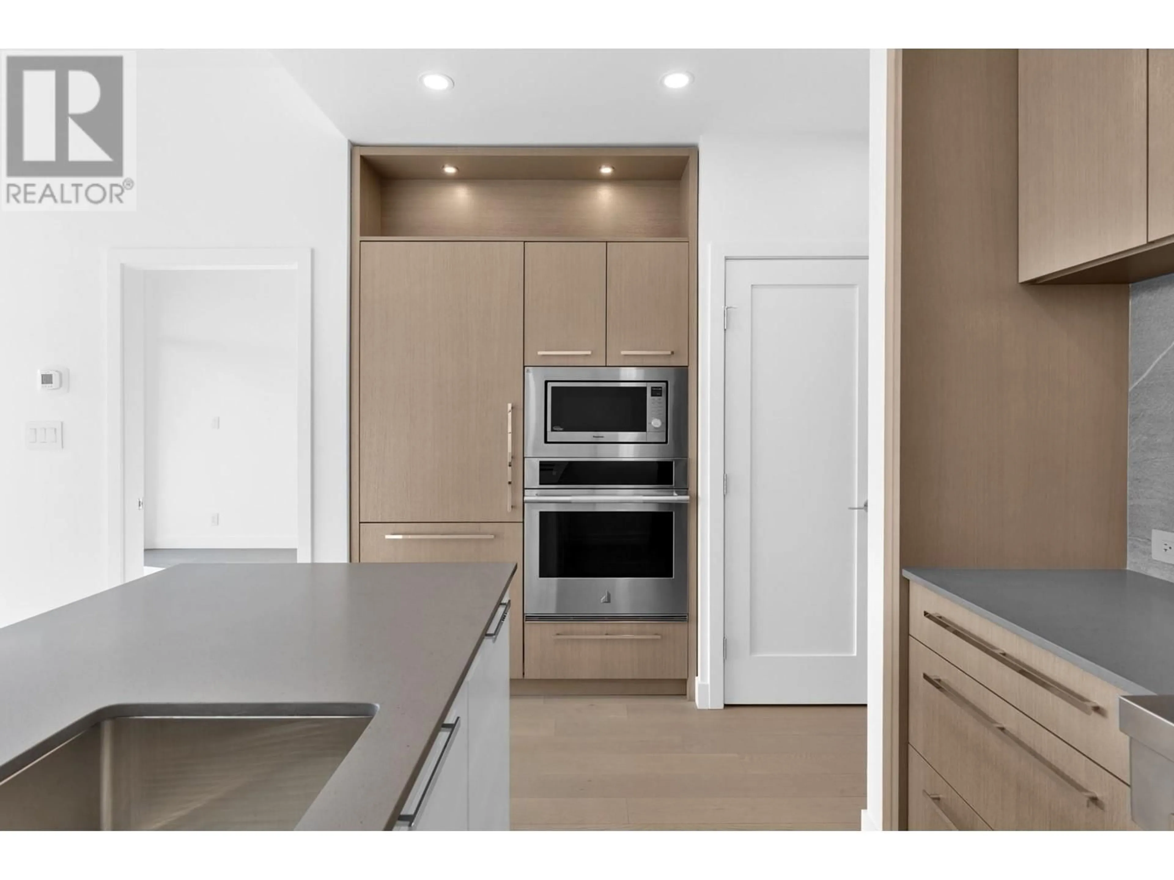Open concept kitchen, unknown for 409 - 3389 LAKESHORE ROAD, Kelowna British Columbia V1W0G5