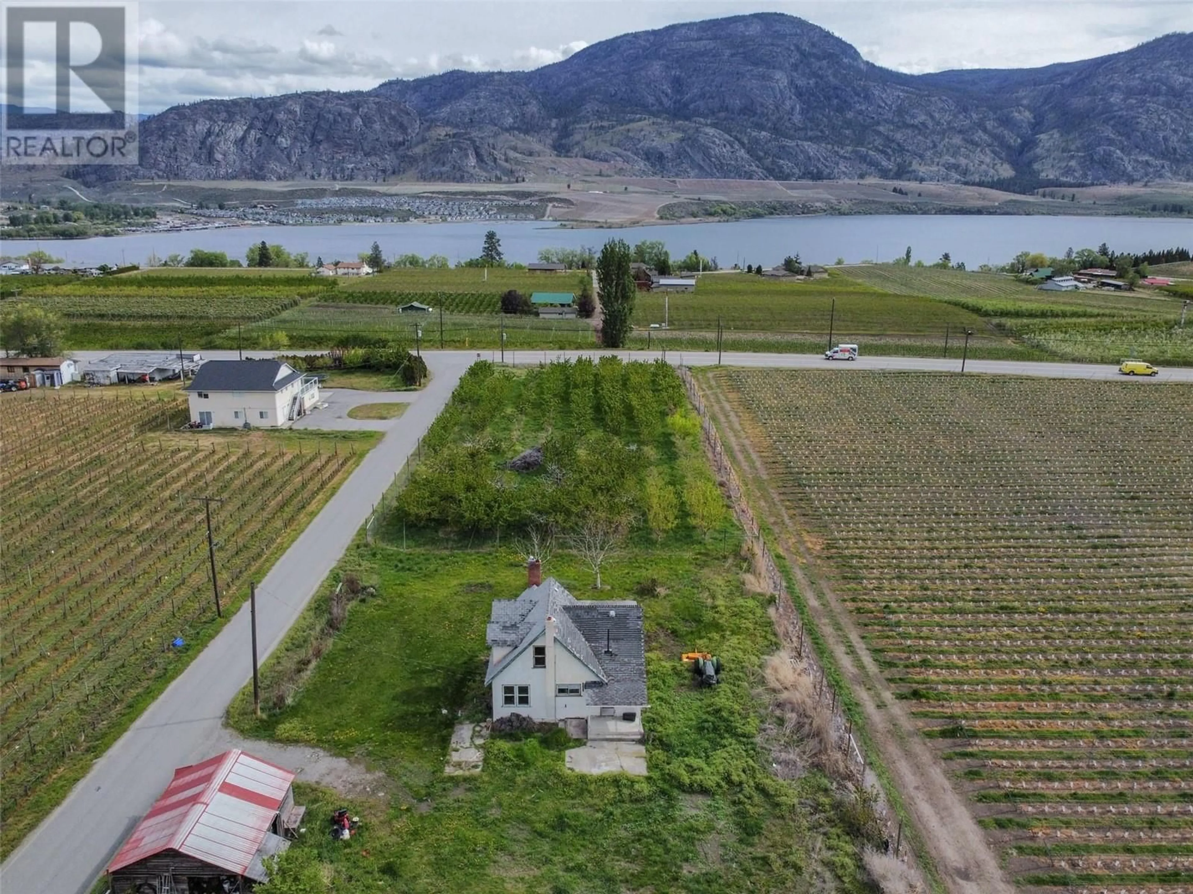 A pic from outside/outdoor area/front of a property/back of a property/a pic from drone, water/lake/river/ocean view for 9723 160TH AVENUE, Osoyoos British Columbia V0H1V0