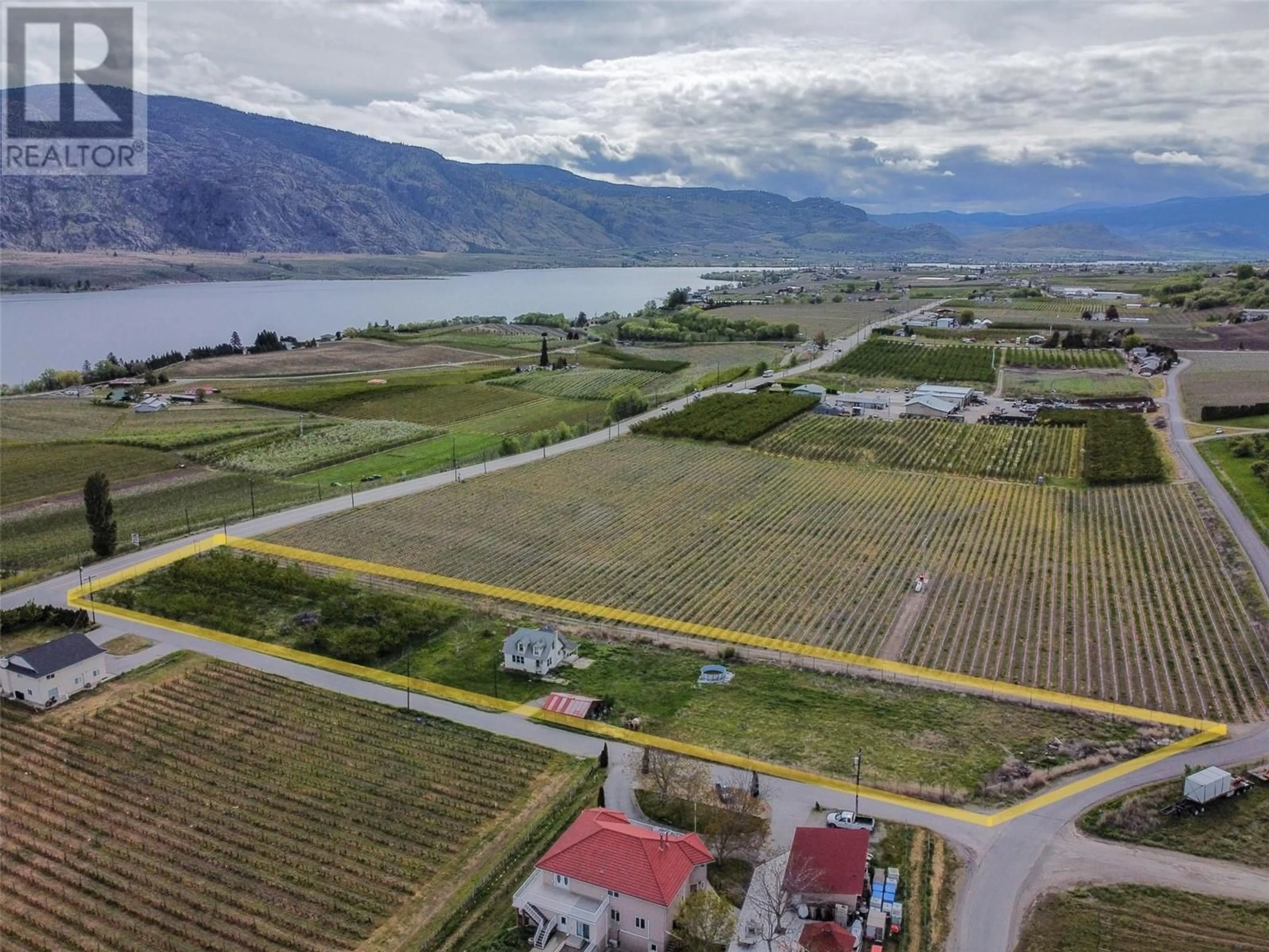 A pic from outside/outdoor area/front of a property/back of a property/a pic from drone, water/lake/river/ocean view for 9723 160TH AVENUE, Osoyoos British Columbia V0H1V0