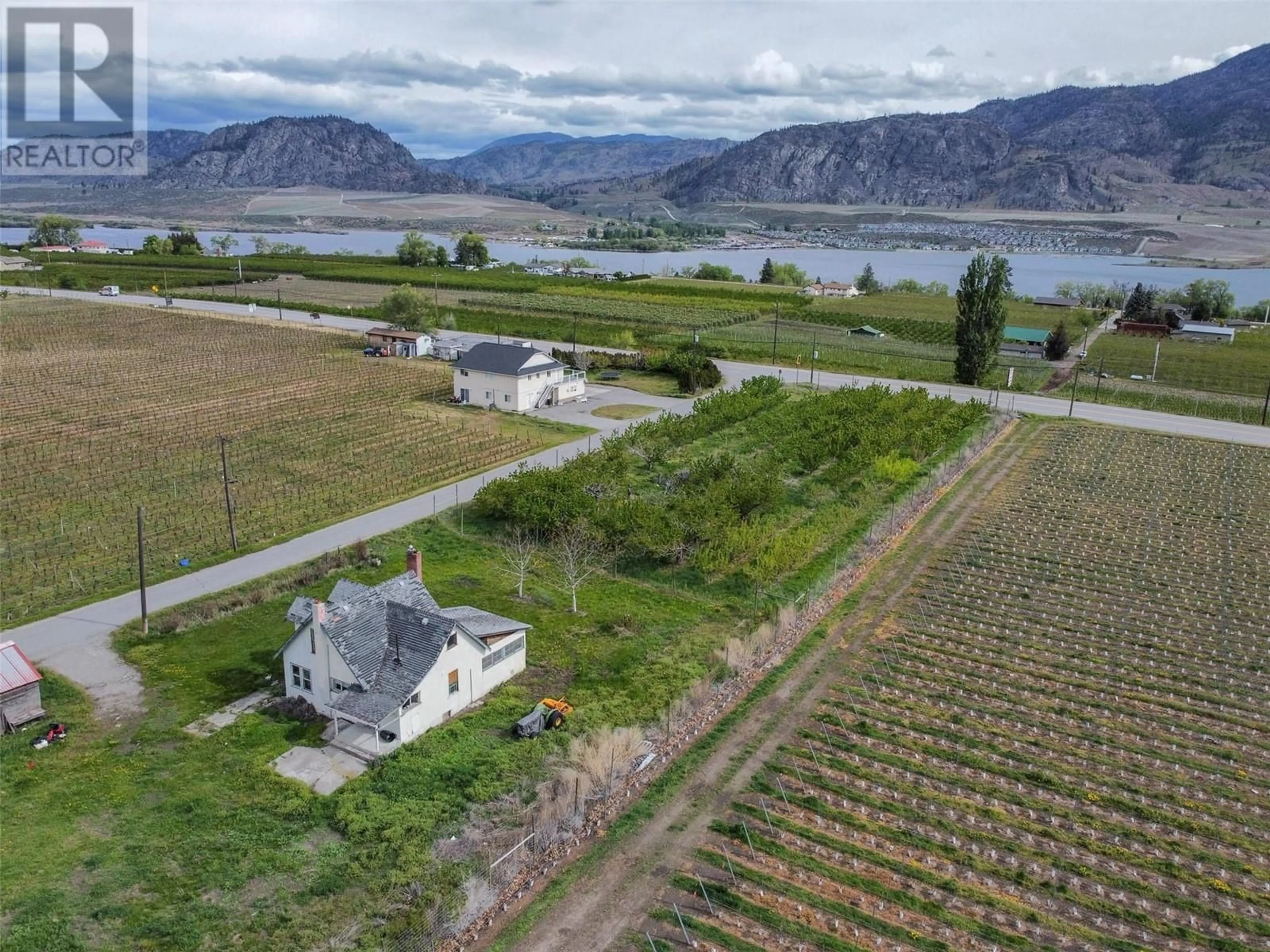 A pic from outside/outdoor area/front of a property/back of a property/a pic from drone, water/lake/river/ocean view for 9723 160TH AVENUE, Osoyoos British Columbia V0H1V0