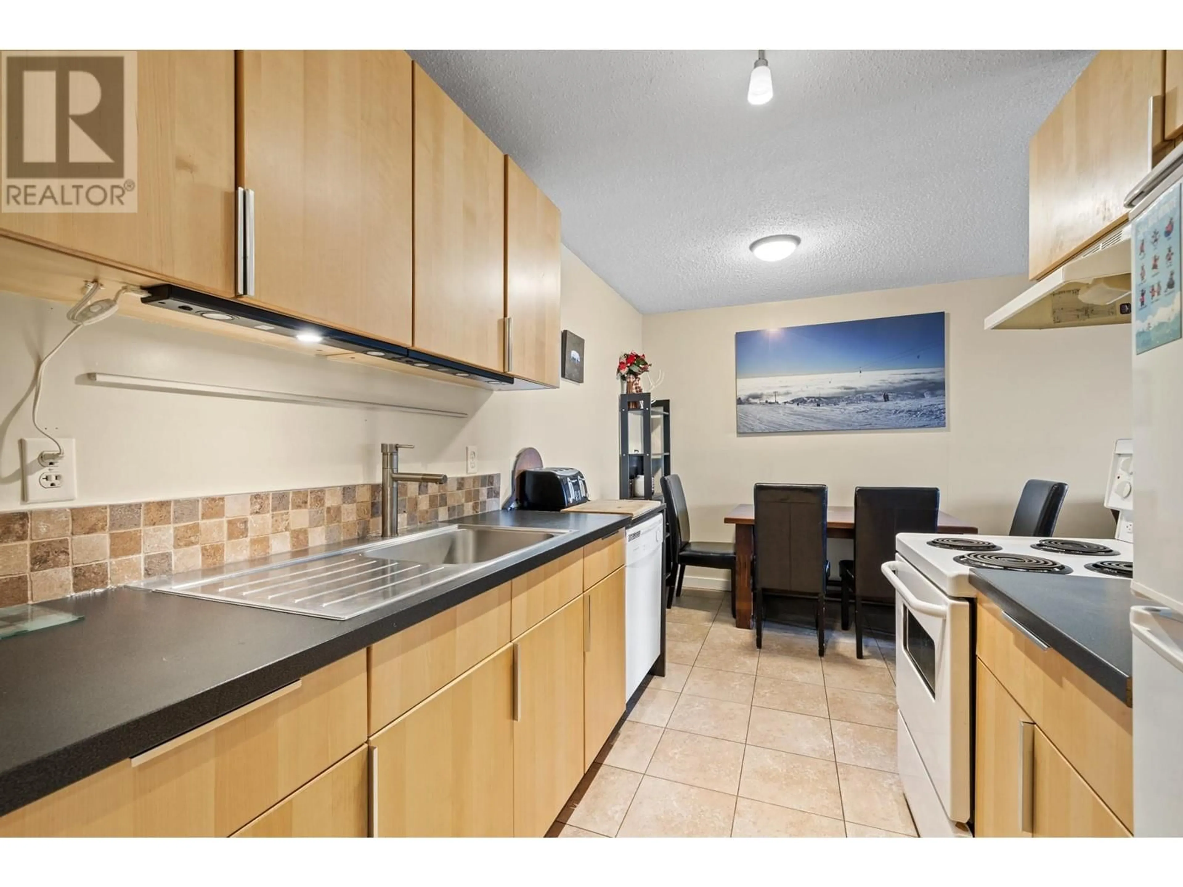 Standard kitchen, ceramic/tile floor for 303 - 6430 WHISKEY JACK ROAD, Big White British Columbia V1P1P3
