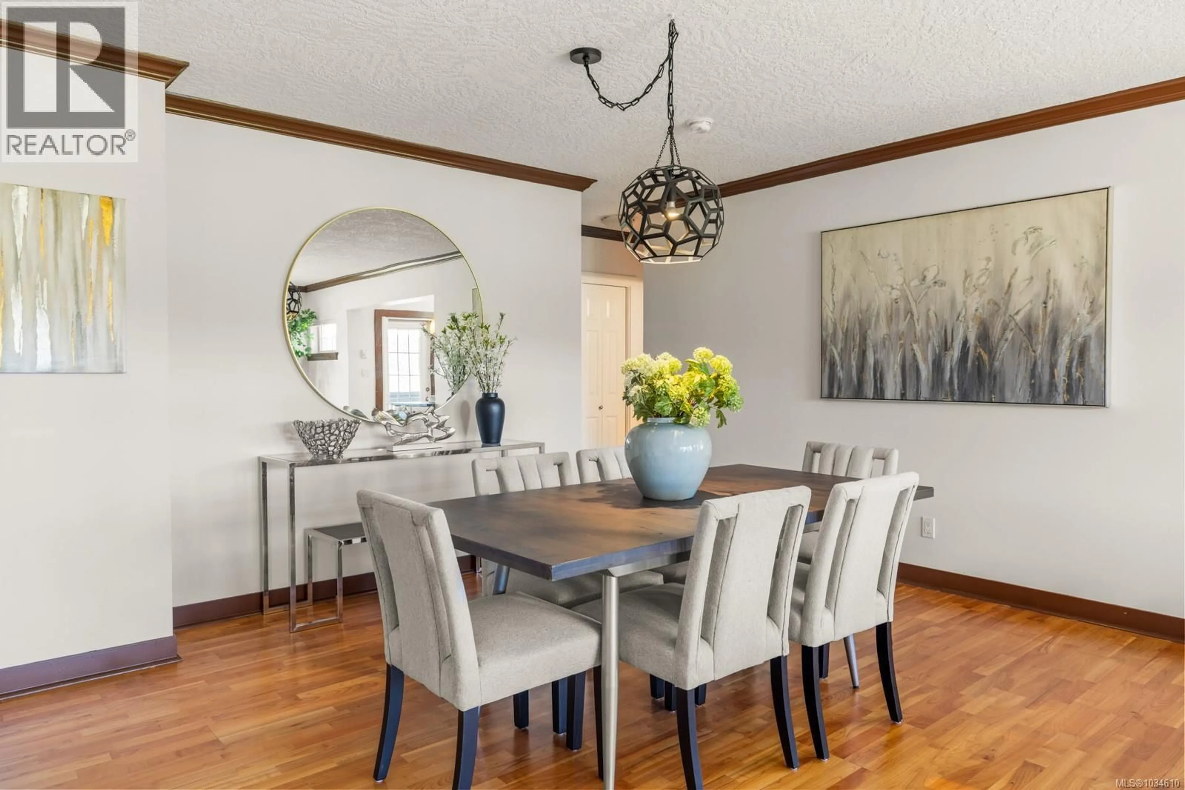 Dining room, wood/laminate floor for 211 - 4480 CHATTERTON WAY, Saanich British Columbia V8X5H7