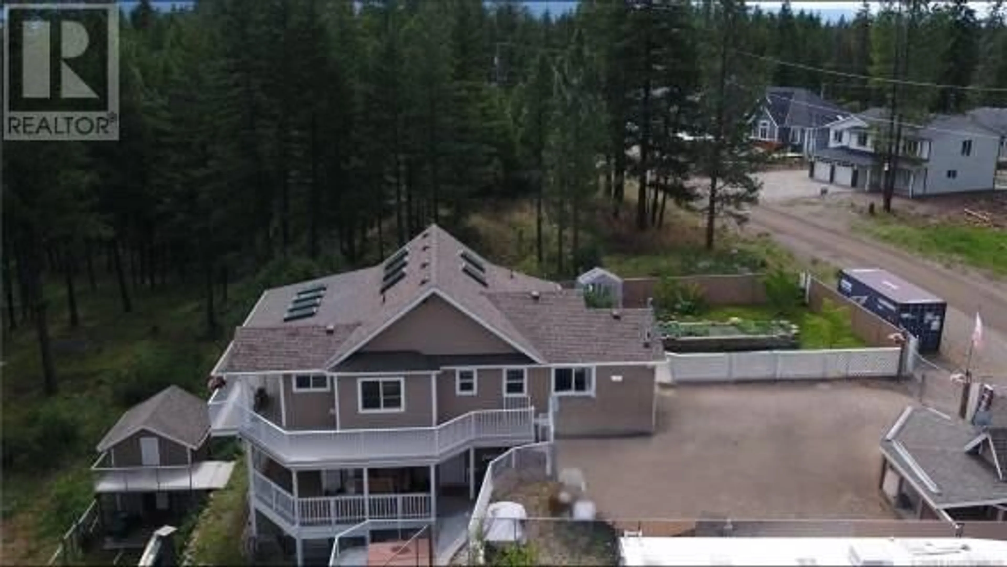A pic from outside/outdoor area/front of a property/back of a property/a pic from drone, mountain view for 674 MUIR ROAD, Kelowna British Columbia V1Z3W2