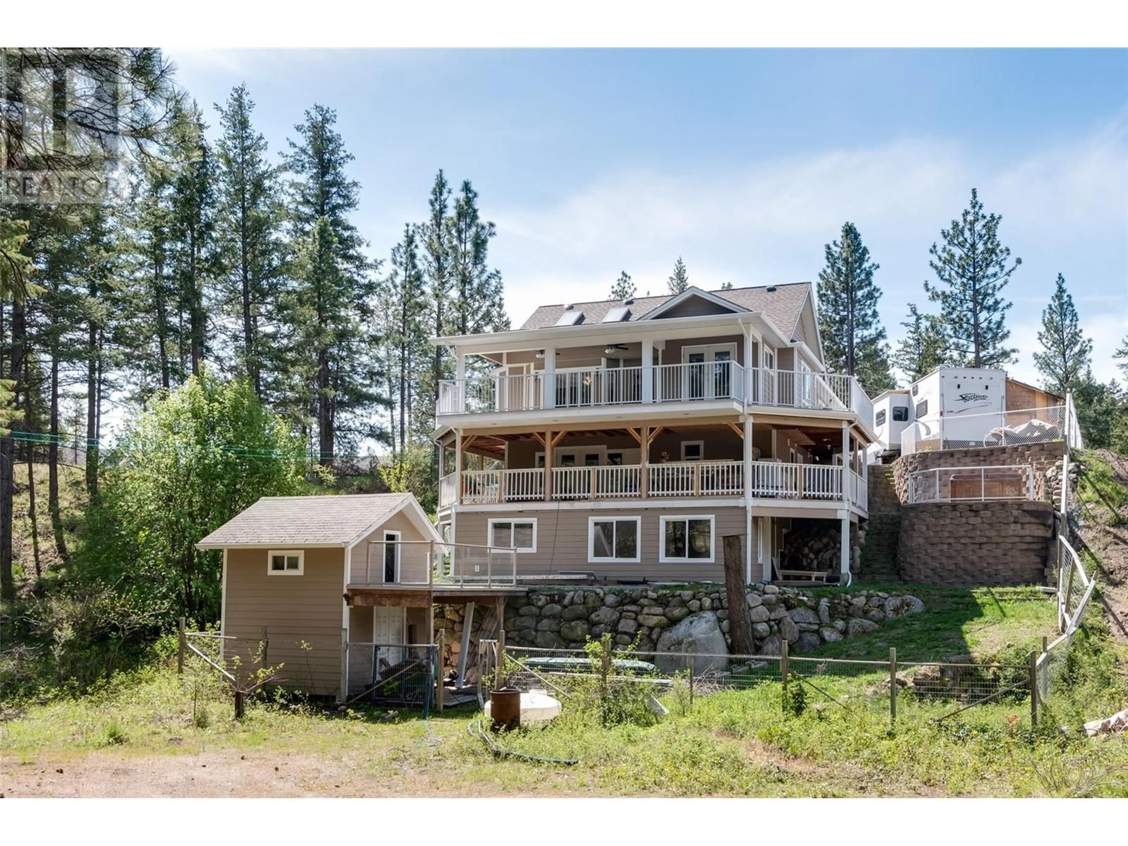 A pic from outside/outdoor area/front of a property/back of a property/a pic from drone, mountain view for 674 MUIR ROAD, Kelowna British Columbia V1Z3W2
