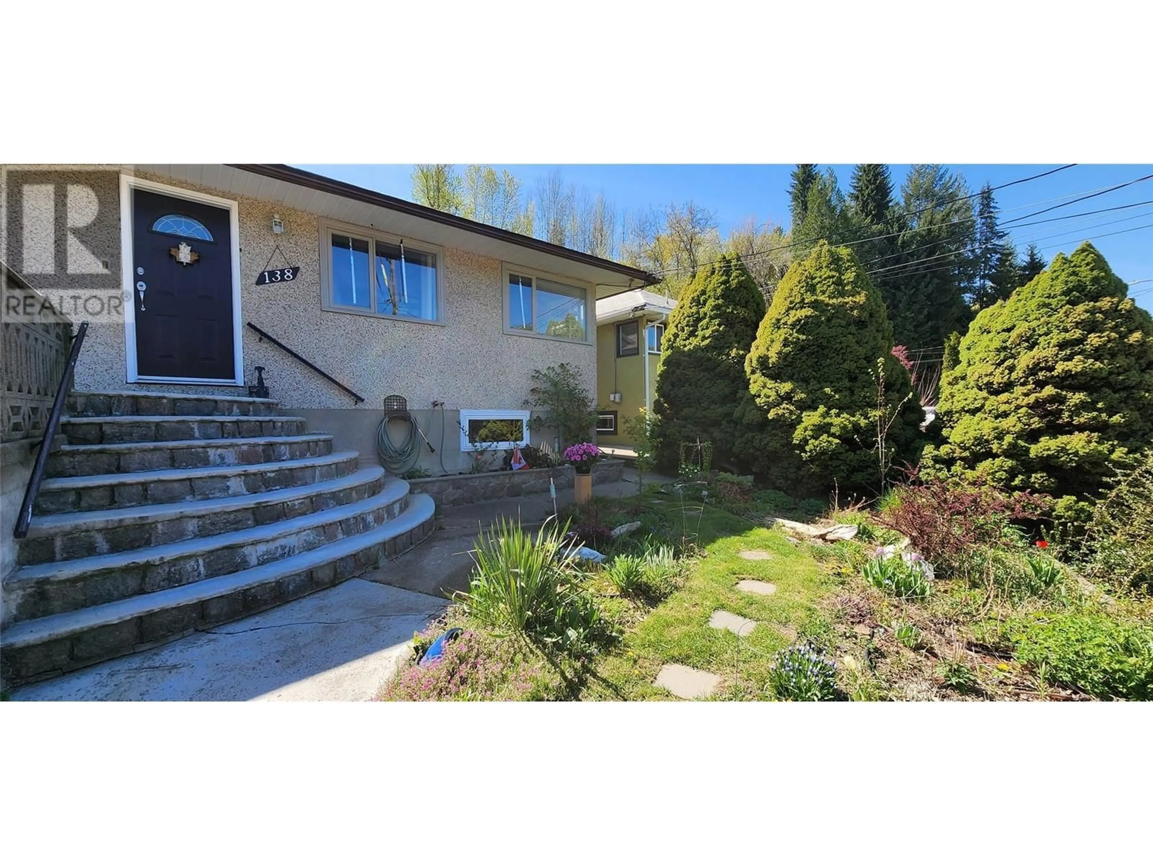 A pic from outside/outdoor area/front of a property/back of a property/a pic from drone, street for 138 COLLEY STREET, Warfield British Columbia V1R2M2