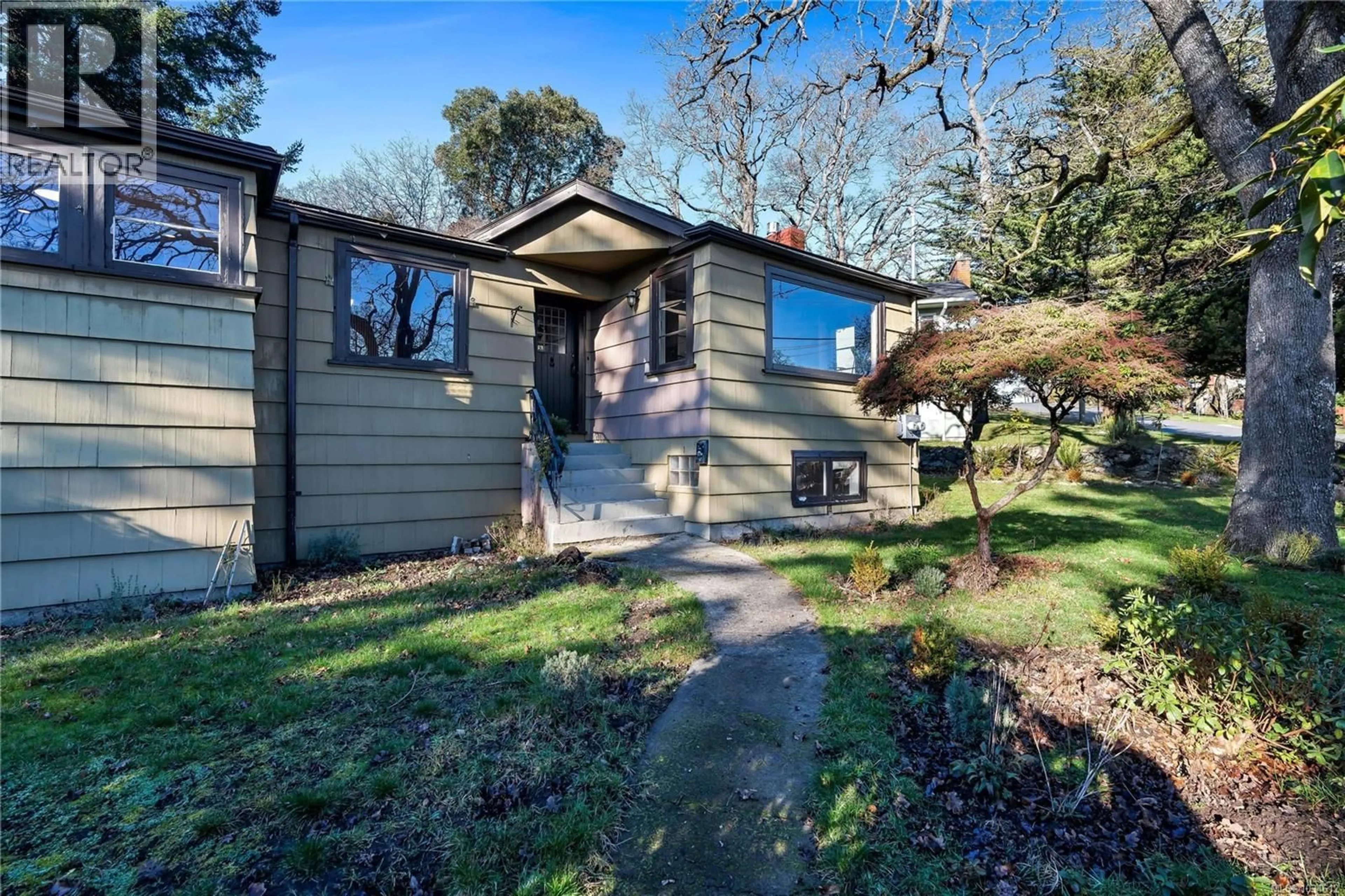 Home with vinyl exterior material, street for 3580 DONCASTER DRIVE, Saanich British Columbia V8P3W3