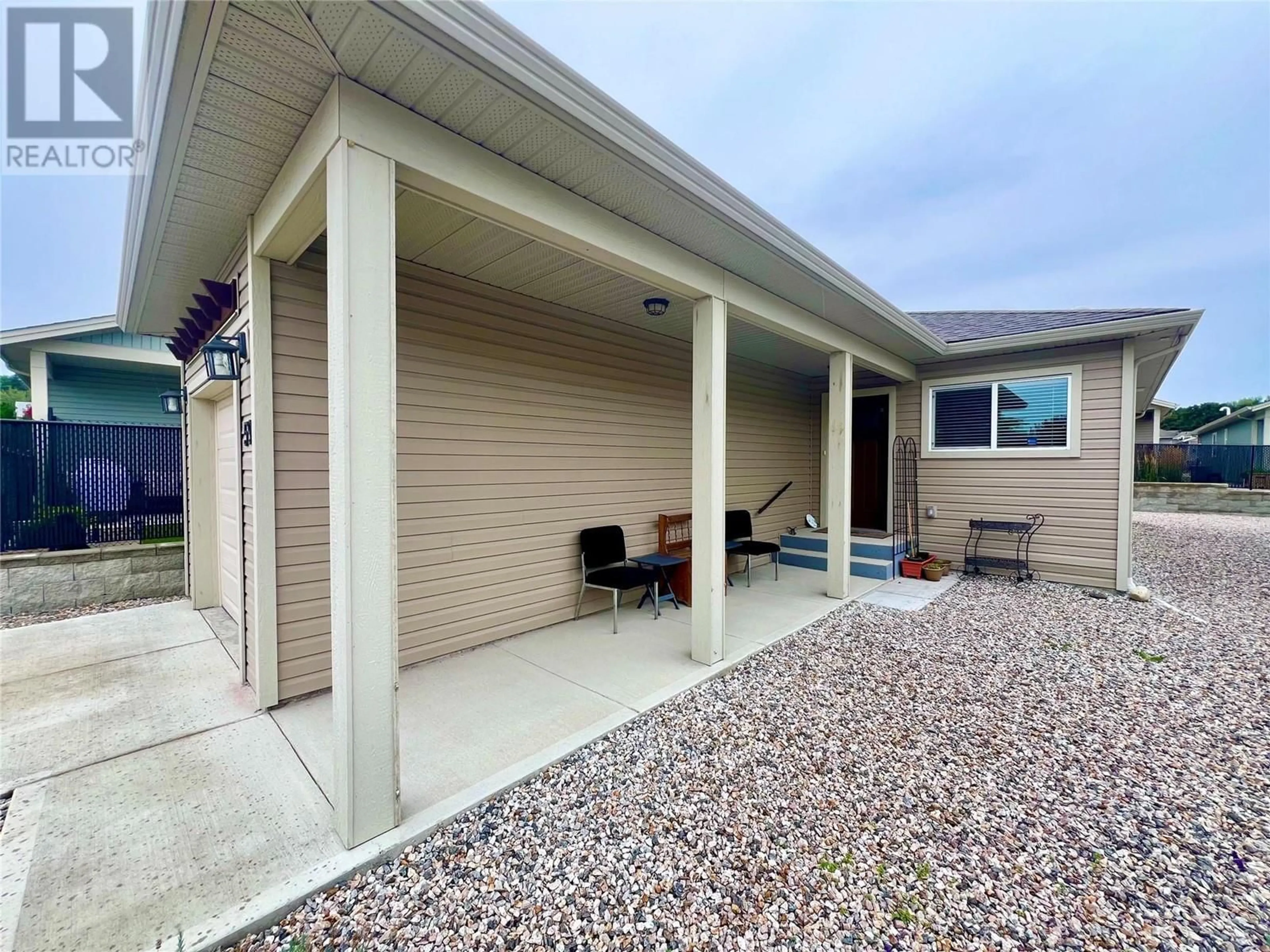 Home with vinyl exterior material, street for 59 - 2100 55 AVENUE, Vernon British Columbia V1T9Y6