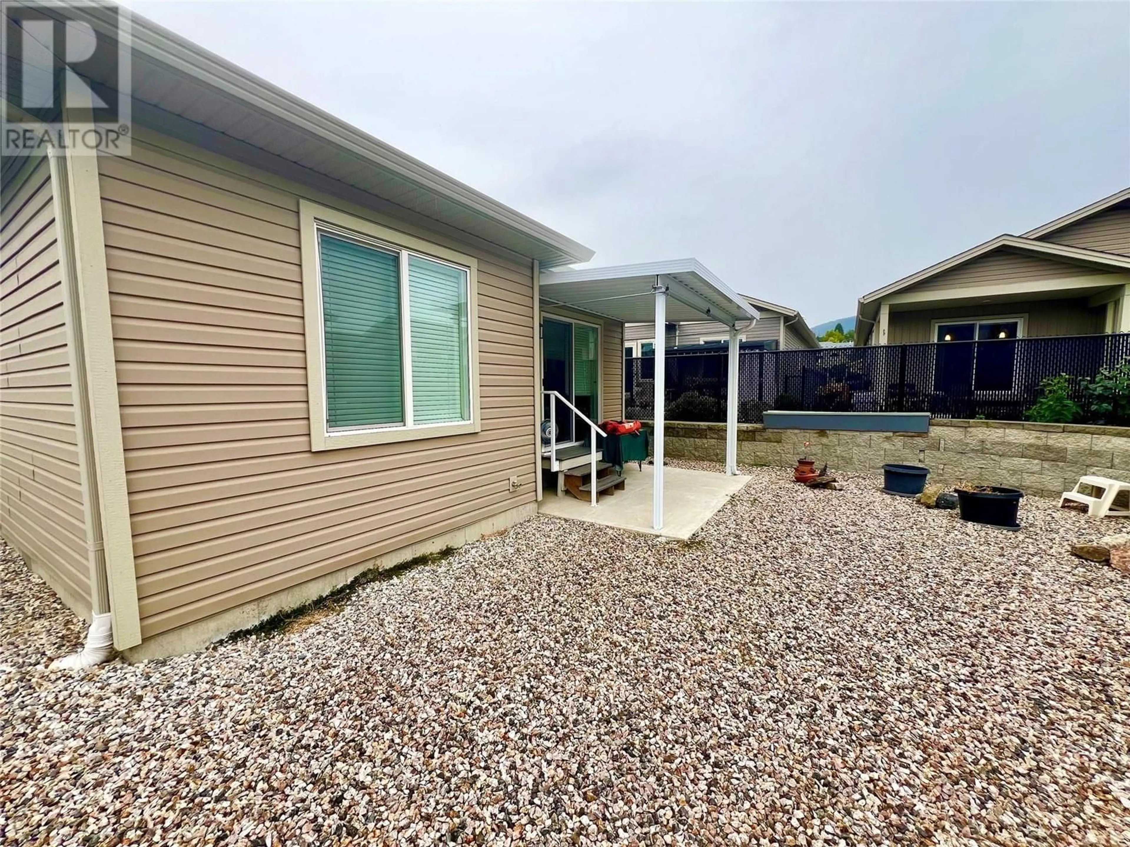 Home with vinyl exterior material, water/lake/river/ocean view for 59 - 2100 55 AVENUE, Vernon British Columbia V1T9Y6