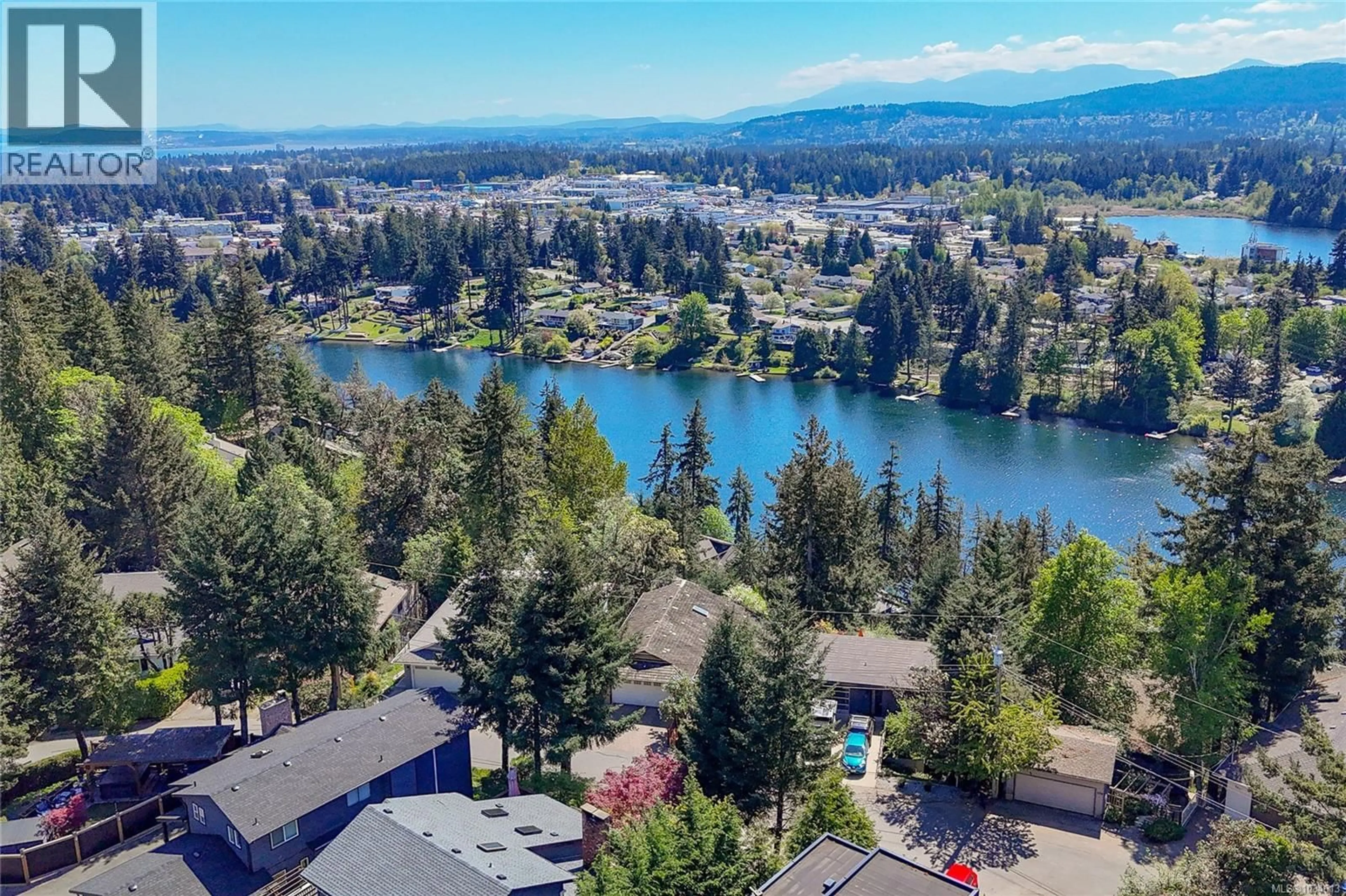 A pic from outside/outdoor area/front of a property/back of a property/a pic from drone, water/lake/river/ocean view for 150 RAINBOW CRESCENT, Nanaimo British Columbia V9T4Y2