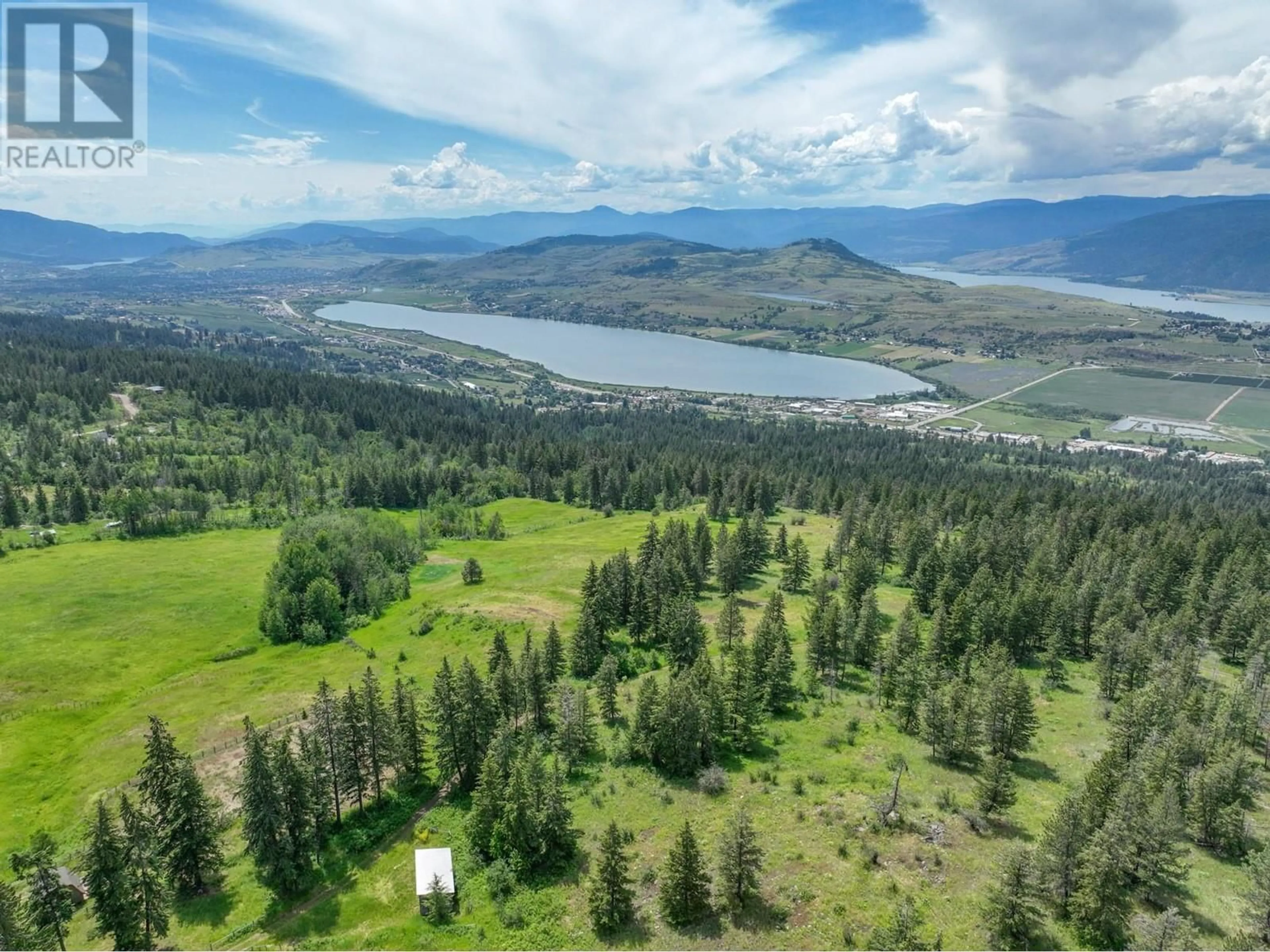 A pic from outside/outdoor area/front of a property/back of a property/a pic from drone, unknown for 8199 MCLENNAN RD ROAD, Vernon British Columbia V1B3S7