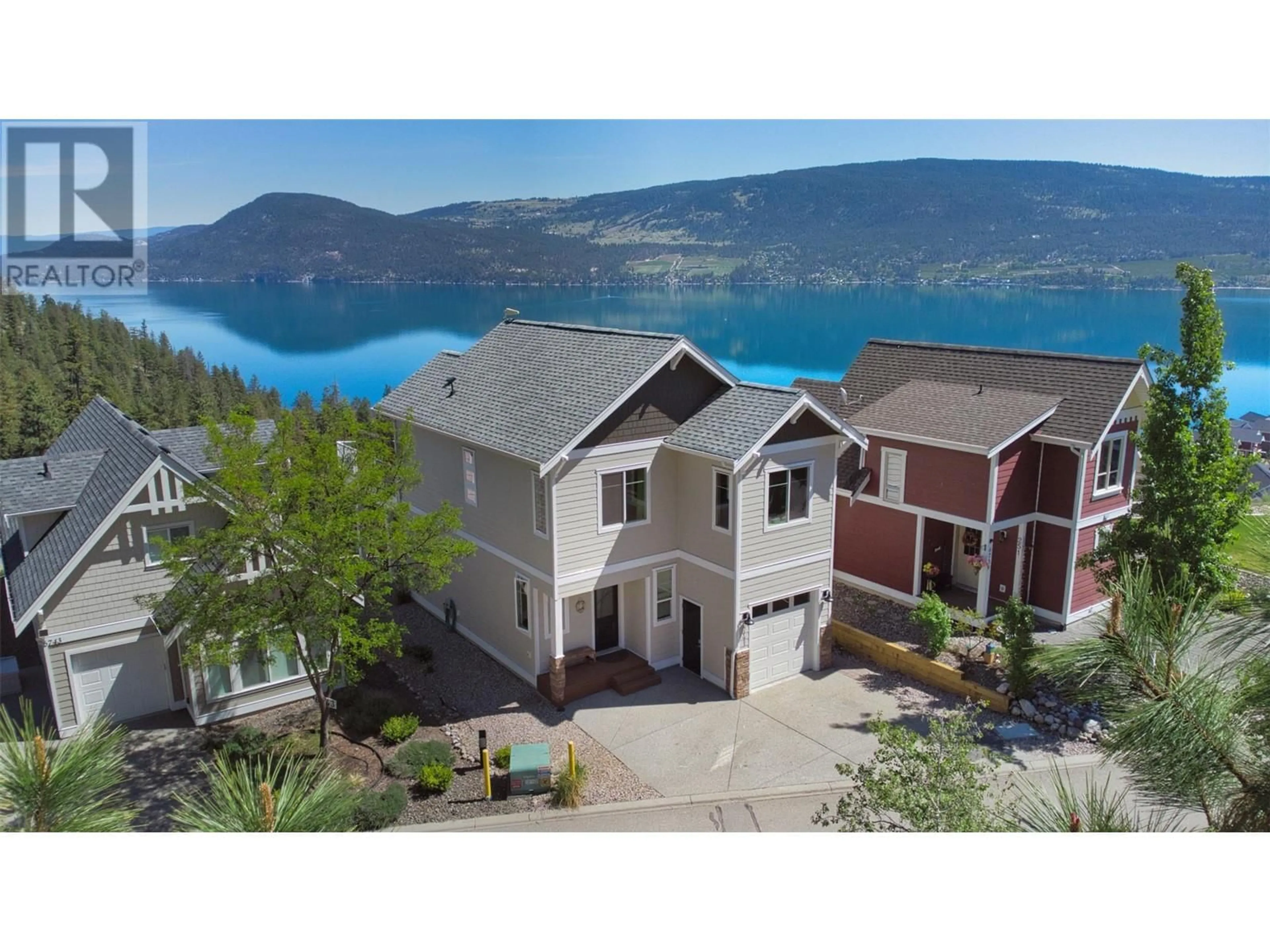 A pic from outside/outdoor area/front of a property/back of a property/a pic from drone, water/lake/river/ocean view for 252 - 6741 LA PALMA LOOP, Kelowna British Columbia V1Z3R8