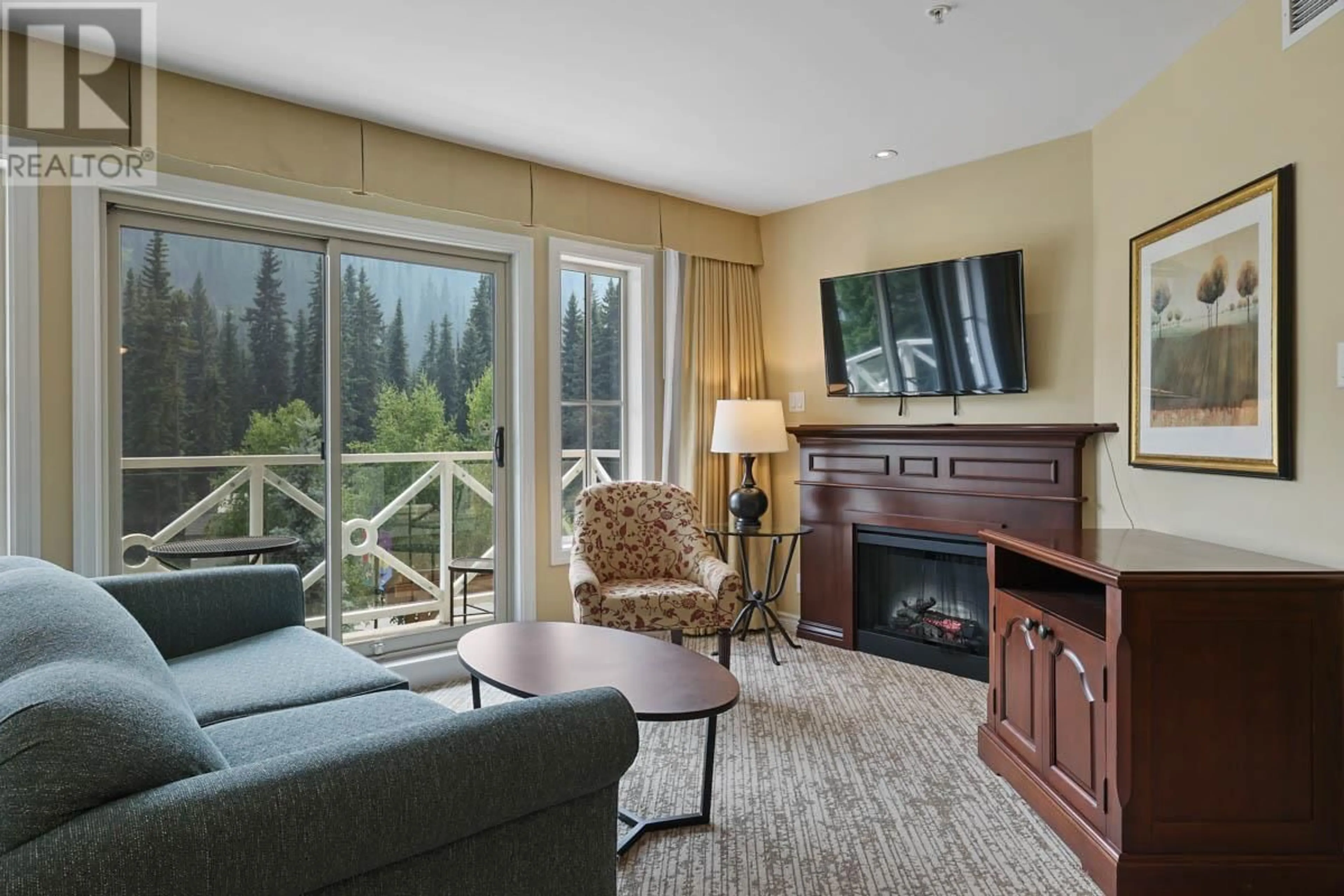 Living room with furniture, unknown for 1313B - 3250 VILLAGE WAY, Sun Peaks British Columbia V0E5N0