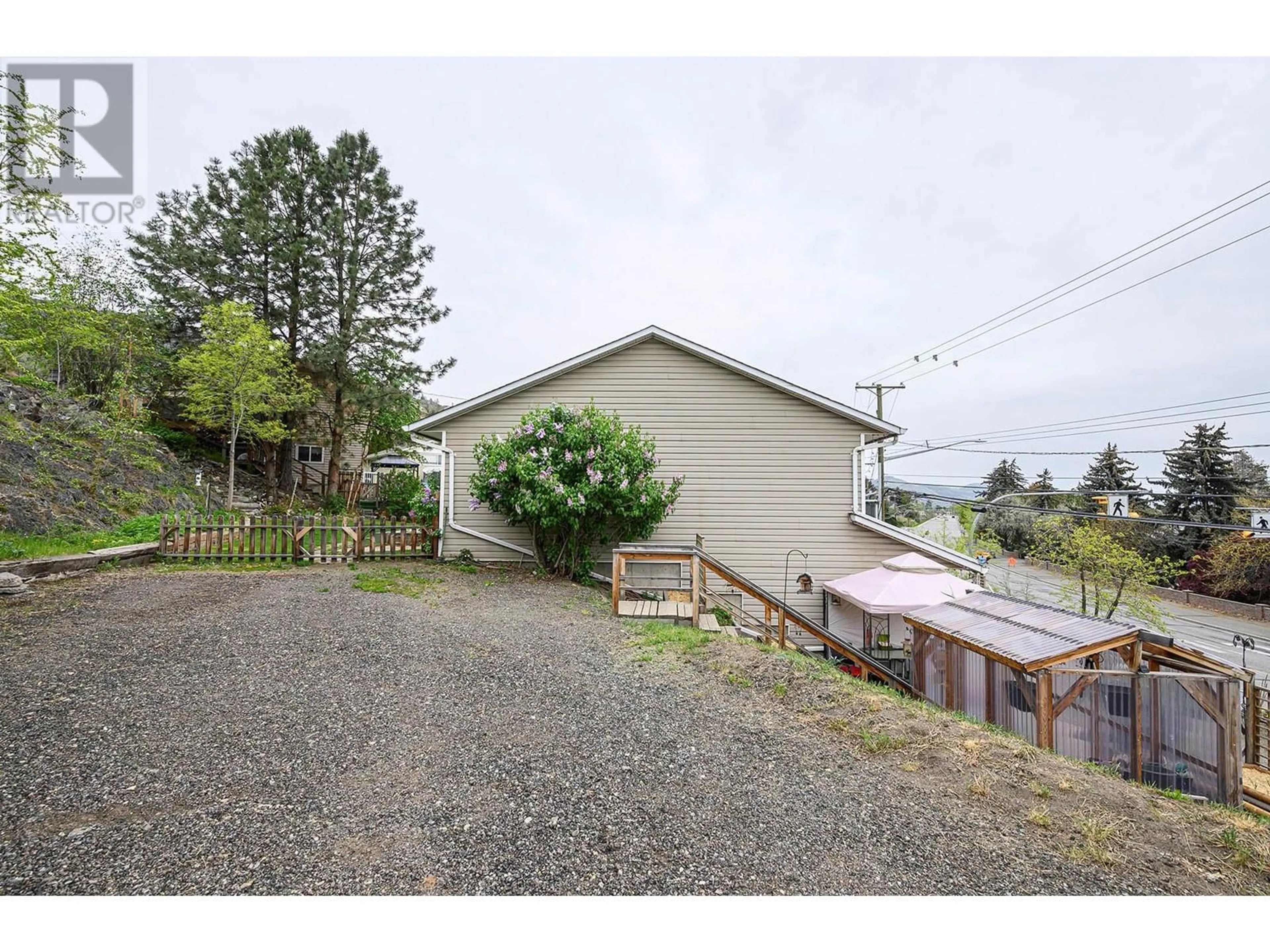 A pic from outside/outdoor area/front of a property/back of a property/a pic from drone, unknown for 2130 WESTSYDE ROAD, Kamloops British Columbia V2B7C2